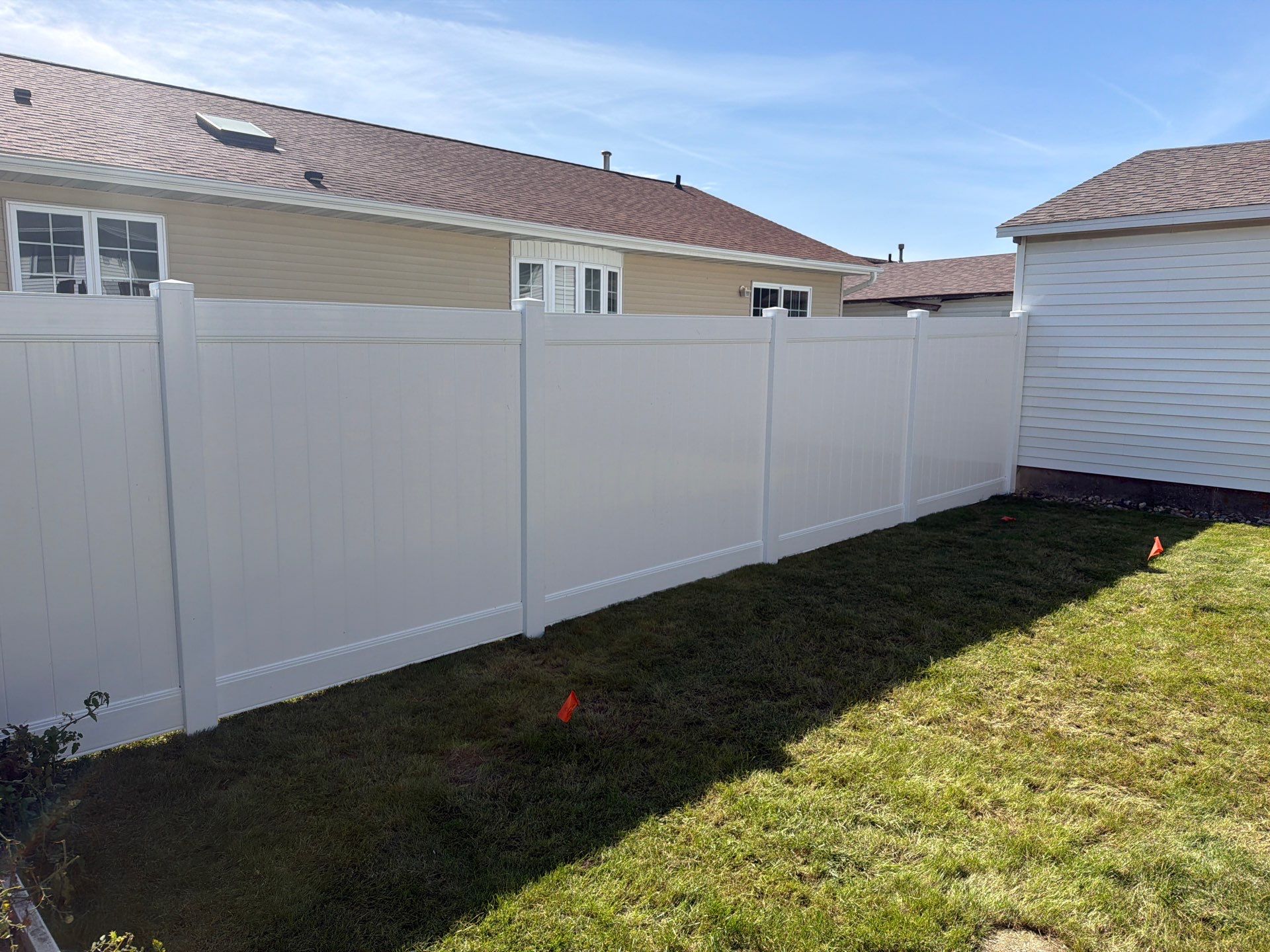 Custom Vinyl Privacy and Chain Link Fence Installation in Waterloo by Perfect Picket Fence and Stain