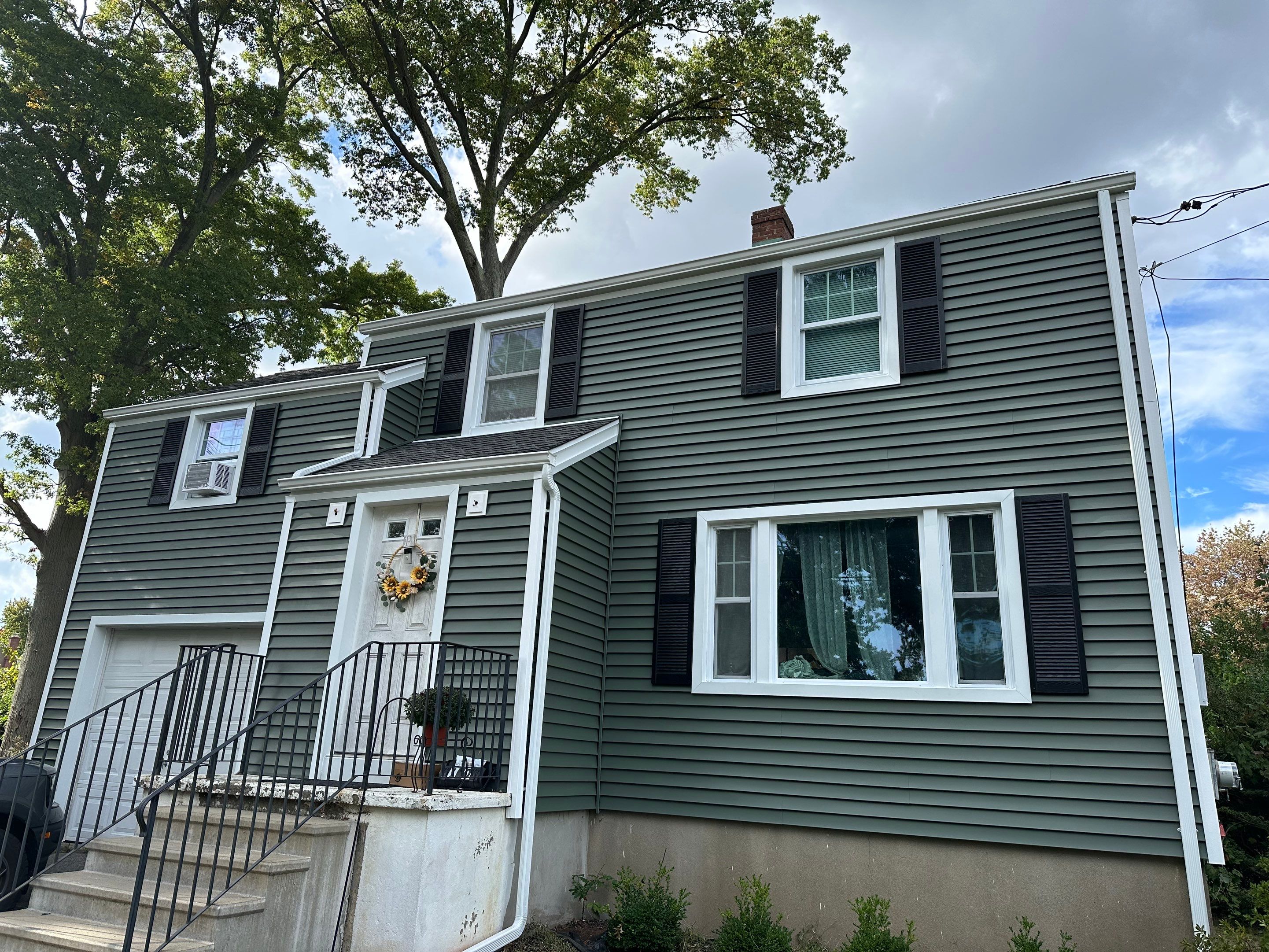 Siding Installation using CertainTeed Monogram Vinyl Siding - D4 - Forest by A Plus Exterior
