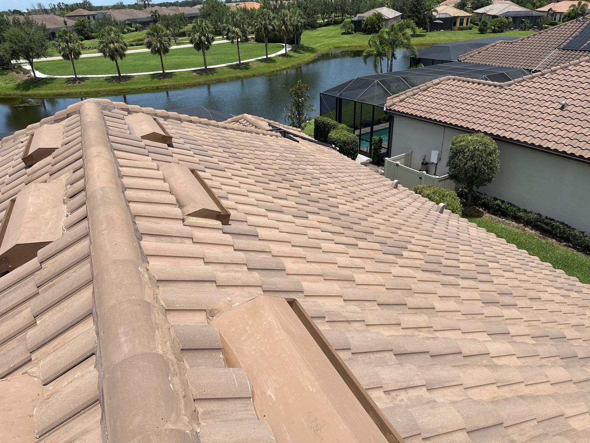 Neighboring Tile Roof Cleaning with Gutter Runoff Control – Palmetto, FL by Sunshine AquaWash