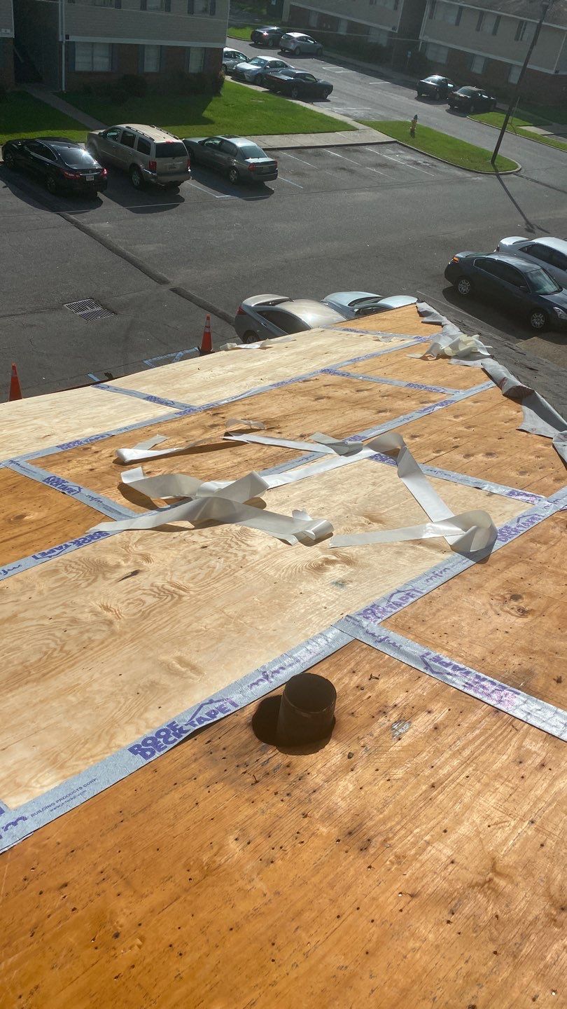 Commercial Roofing Installation using Roof Replacement by American Roofing & Construction LLC