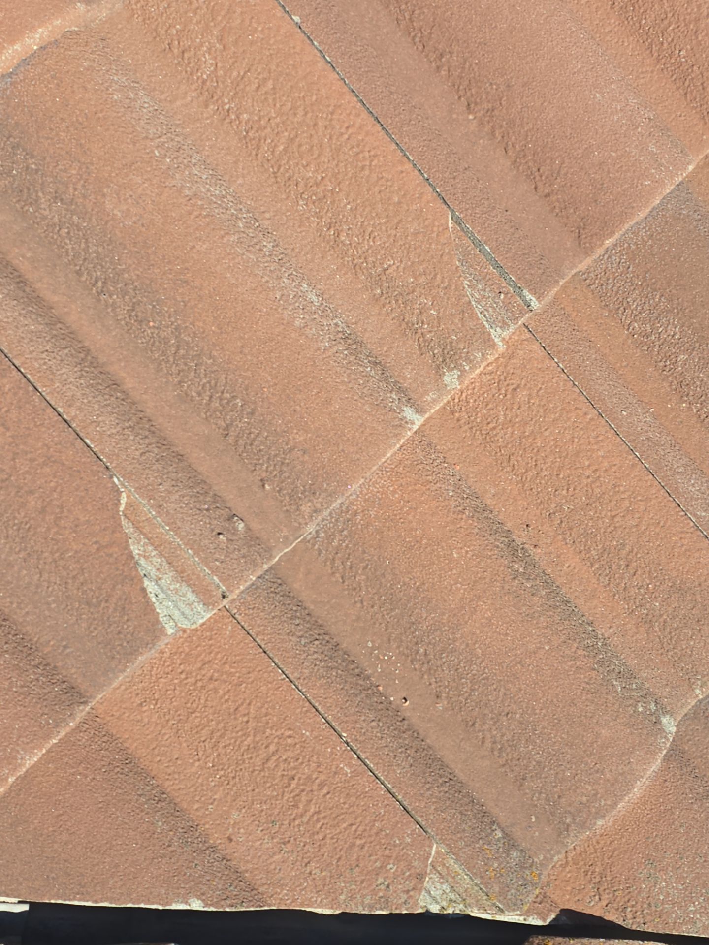 Tile Roof repair by Grandmark Service Company