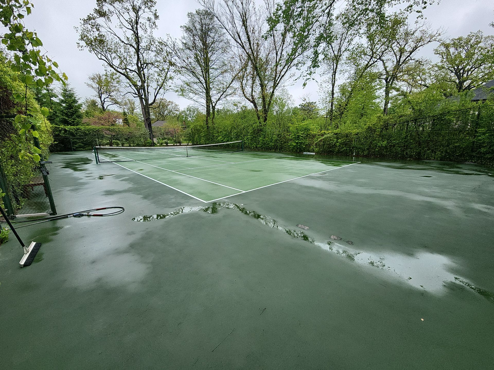 Tennis Court using Algaecide, soft wash soap by Northern Power Washing LLC.
