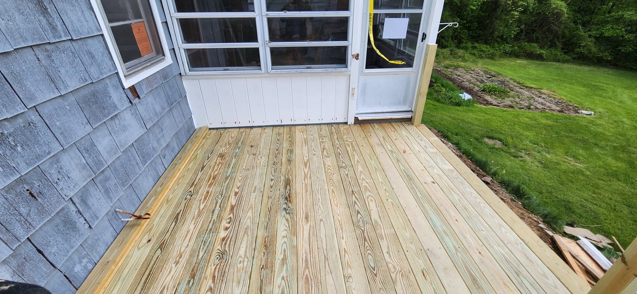 Moultonborough, NH – Pressure-Treated Deck Installation by Tall pine roofing