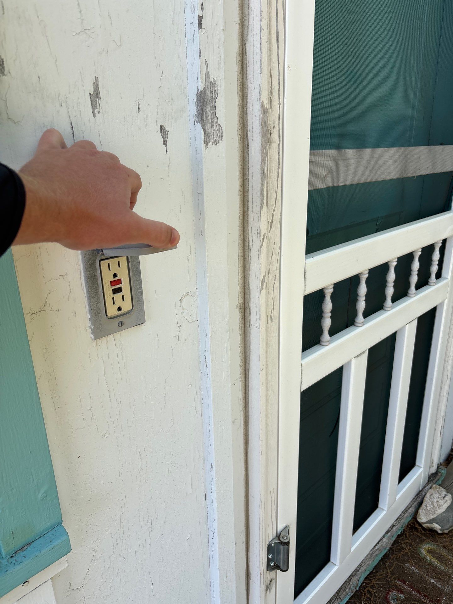 Lakeside Cottage Exterior Painting and Teal Trim Restoration in Mears by Gordon Painting