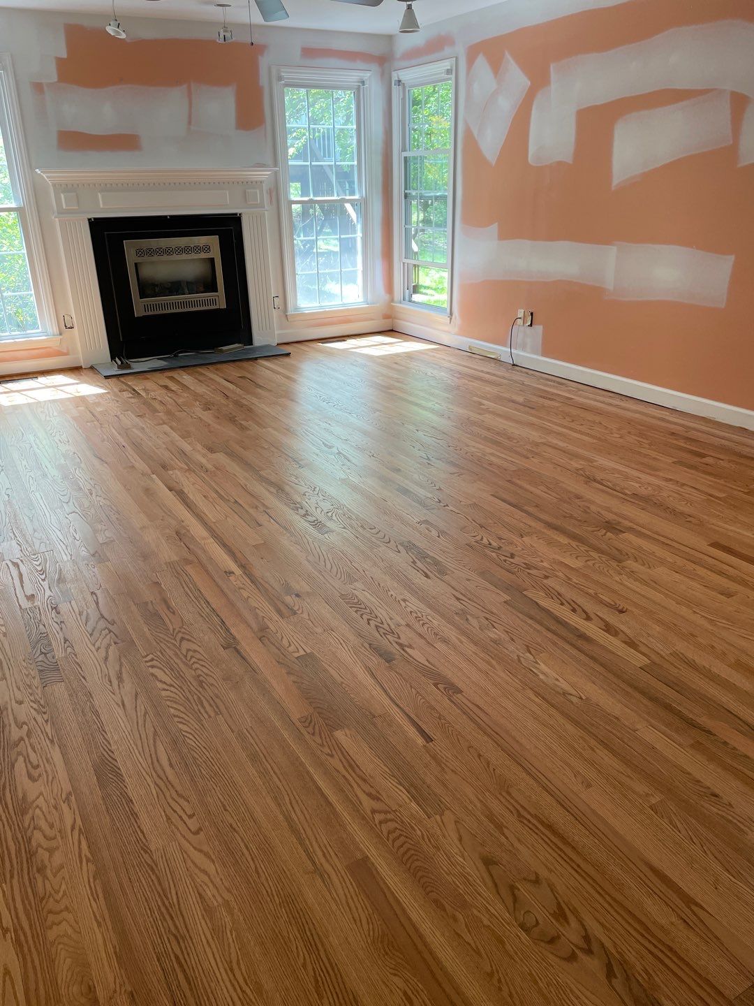 Red oak floor refinishing by Accent Custom Floors
