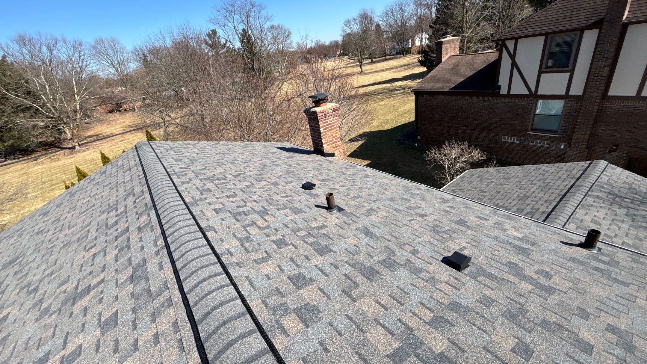Siding Replacement using Alside Charcoal Smoke and Roof Replacement using Owens Corning Peppercorn by 180 Contractors