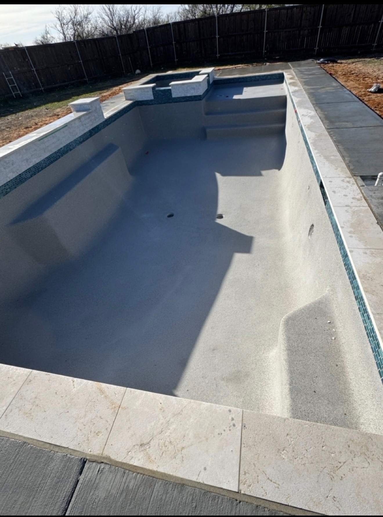 Geometric Pool with Elevated Spa and Night Lighting by Pinnacle Pools and Spas - DFW