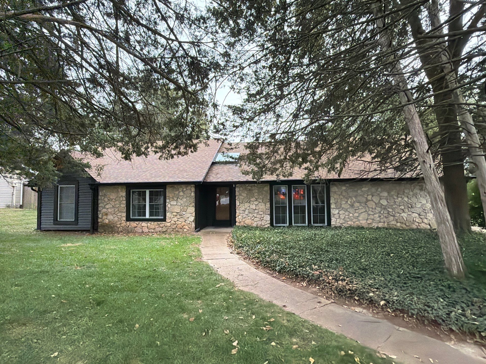 Wood siding refresh by Pezley Painting