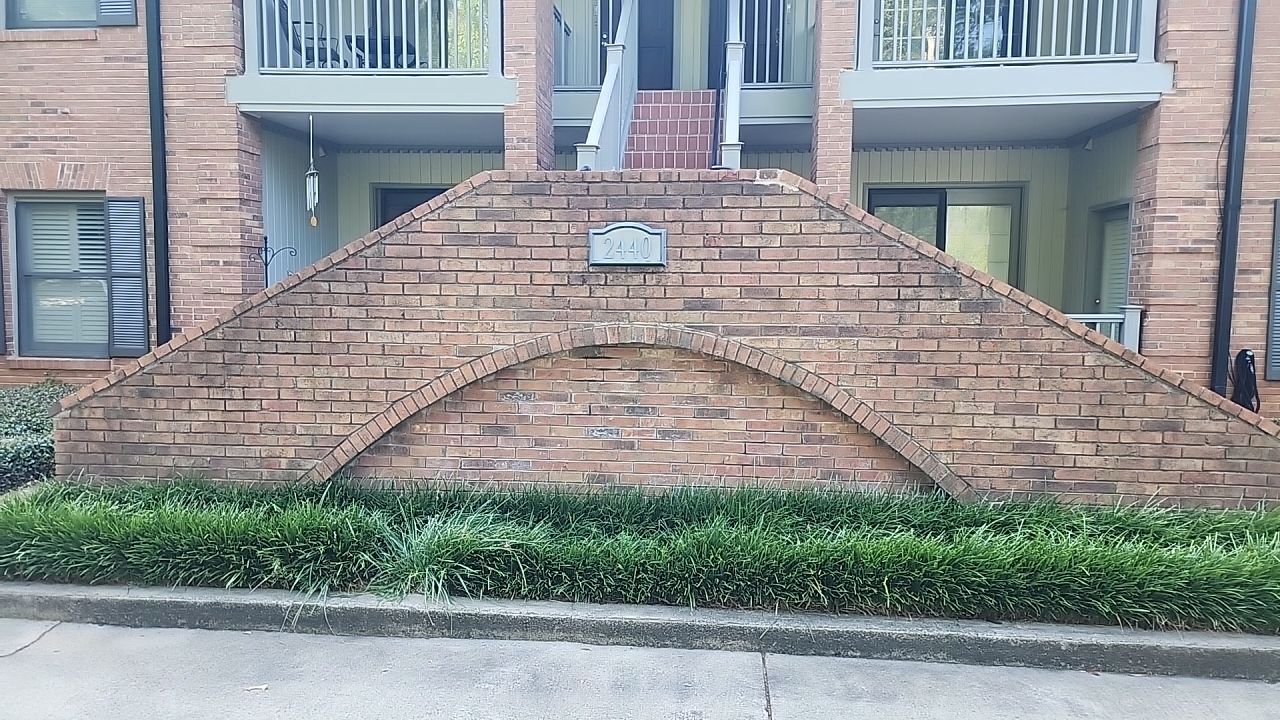 building clean using cleaner by Power Wash Masters LLC