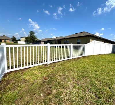 Vinyl Fence Installation using Clearwater Picket Fence and 6Ft White Vinyl Fence
