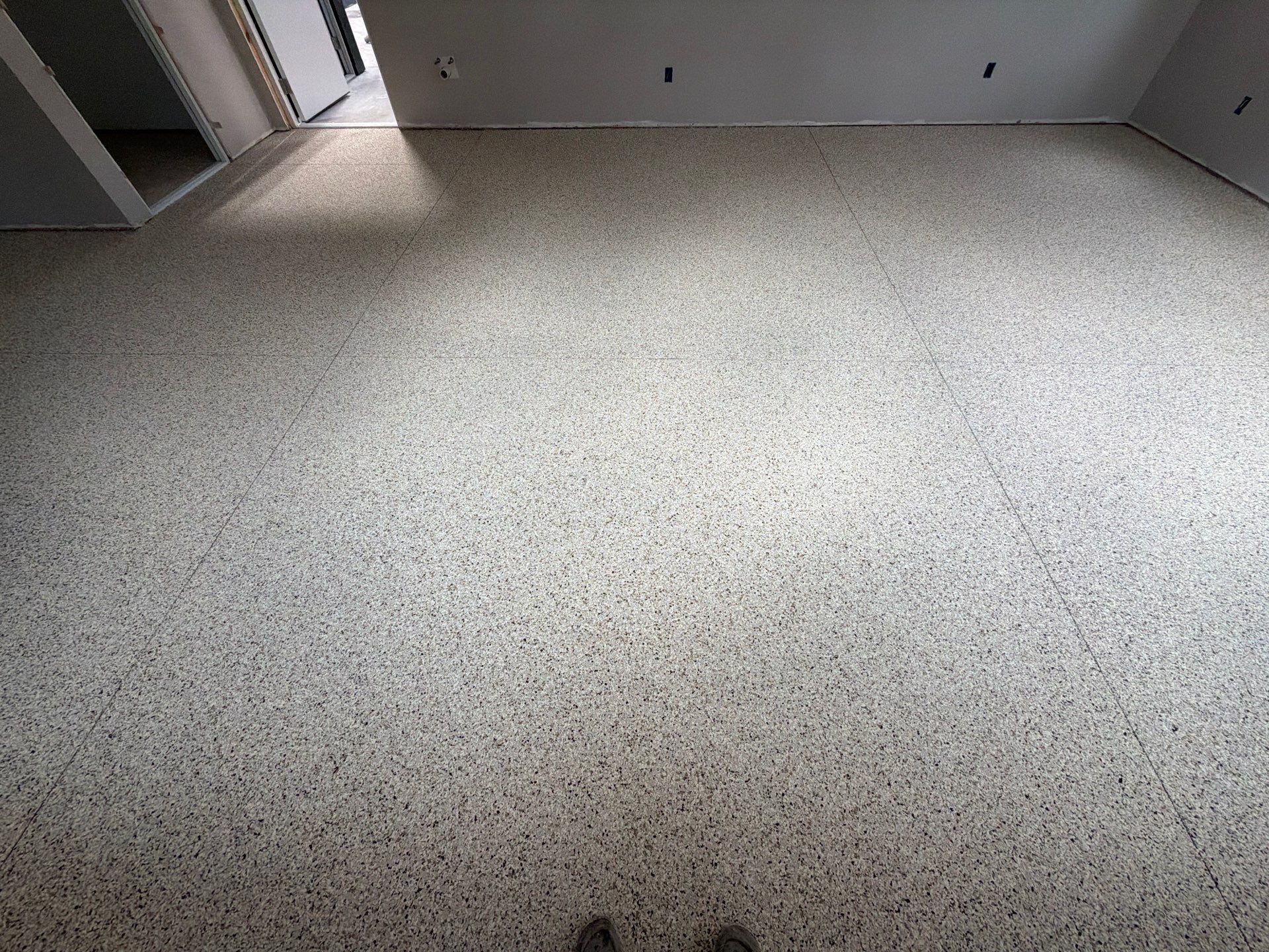 ShoreLine Epoxy Flake Floor Installation for Grand Haven Workshop by Gordon Painting
