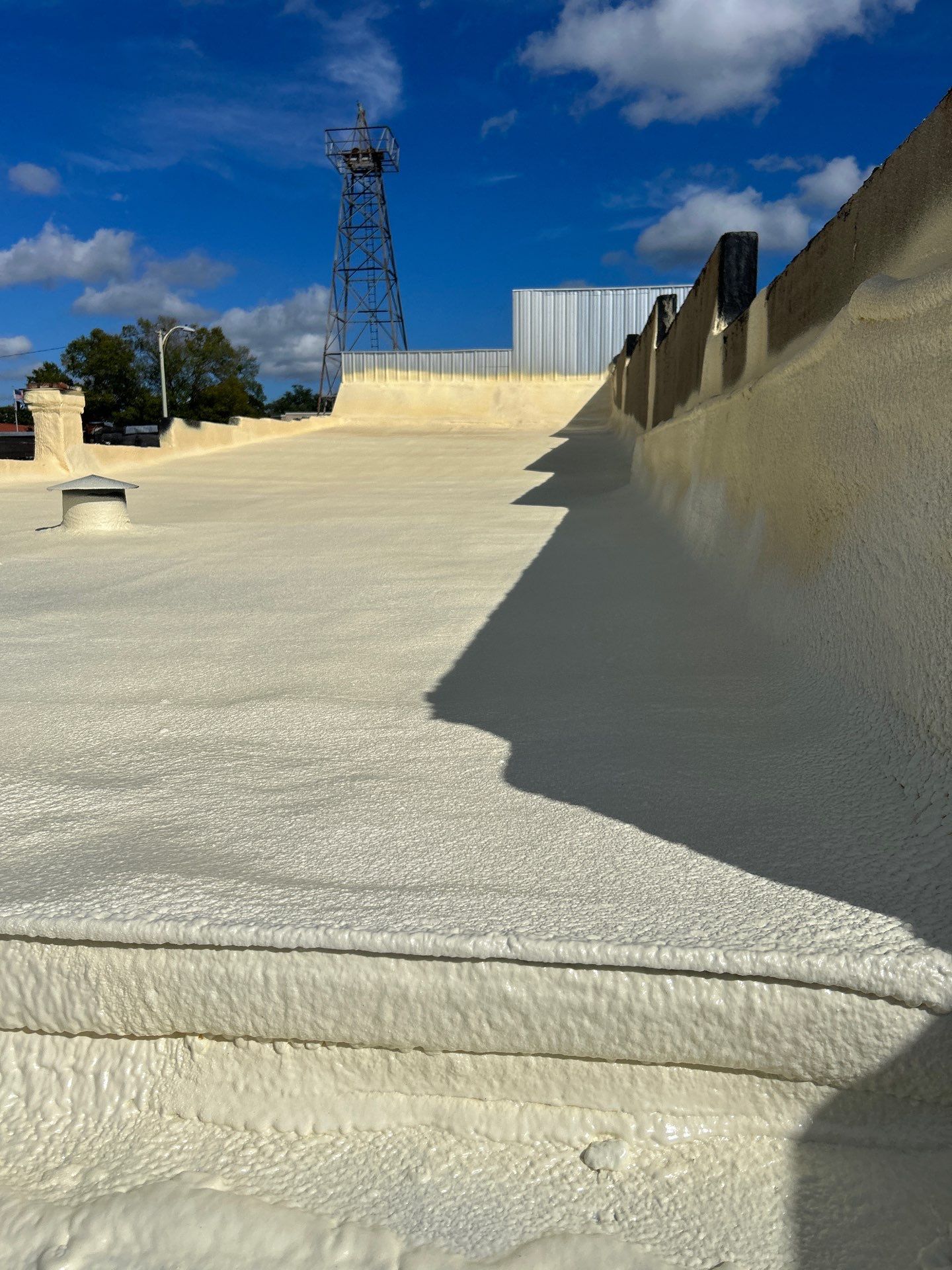 Downtown Gladewater Commercial Foam Roof Restoration – SPF + High-Tensile Acrylic by All Star Roofing LLC