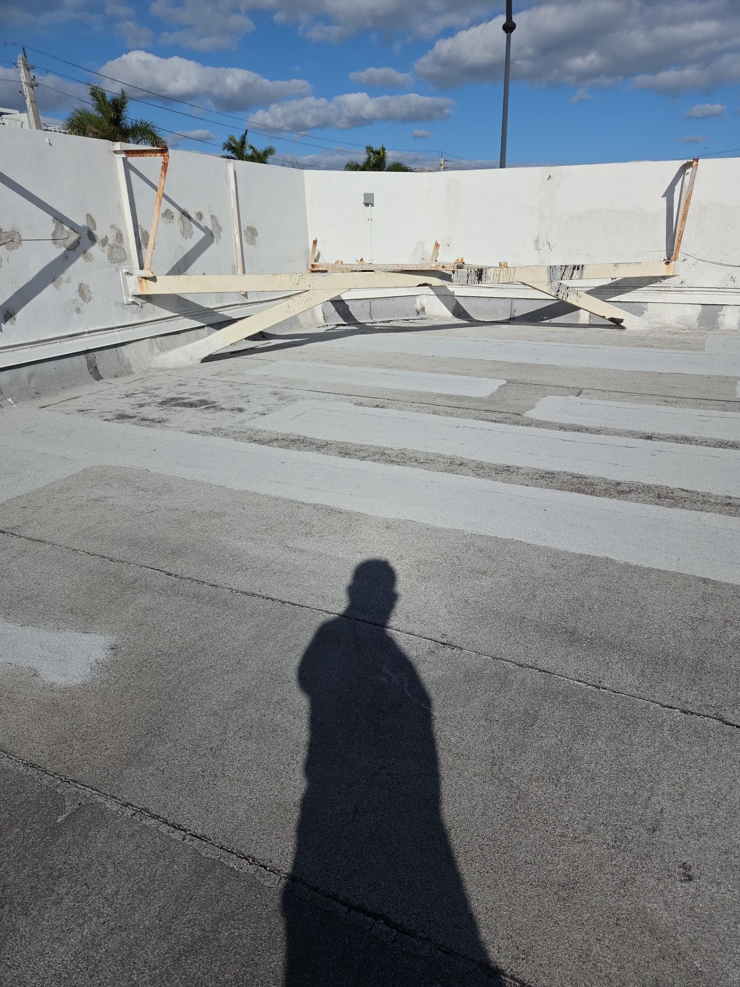Commercial Flat Roof Restoration Using Silicone Coating in Hallandale Beach by Aastro Roofing