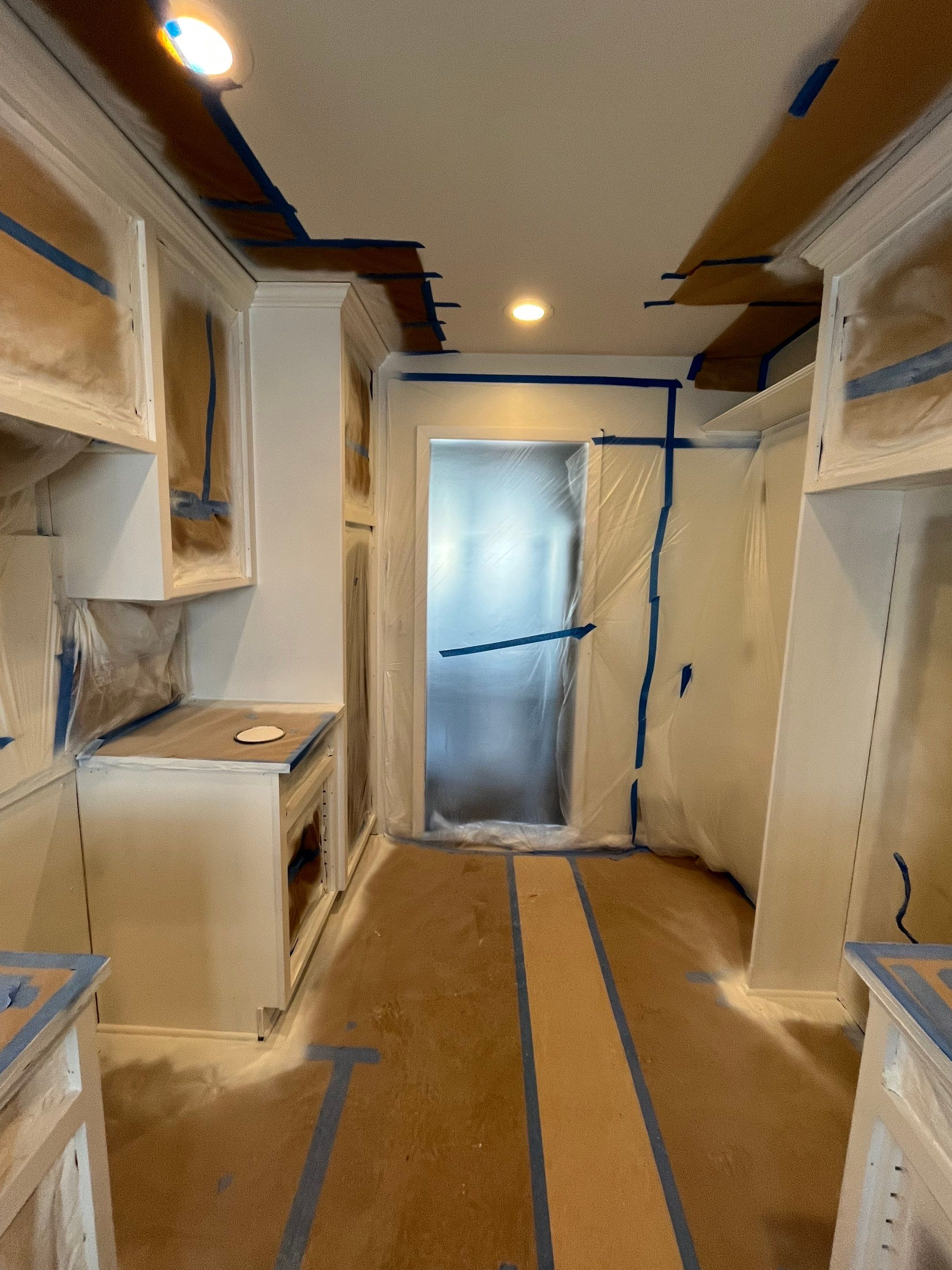 Elegant Transformation: Stained Cabinets Revamped with Sherwin-Williams Juniper by Cougar Painting