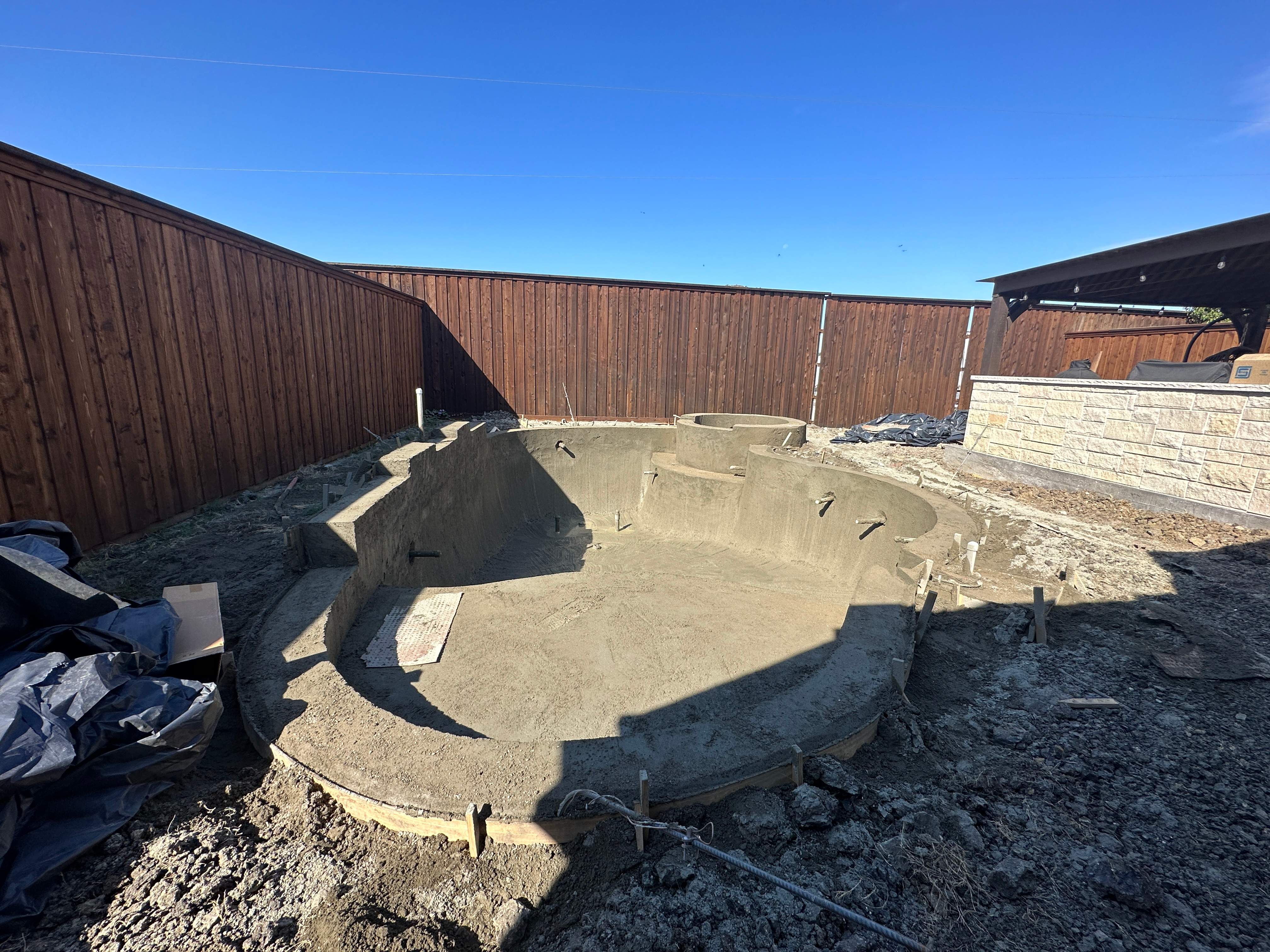 Freeform Pool with Rock Waterfall and Raised Spa by Pinnacle Pools and Spas - DFW