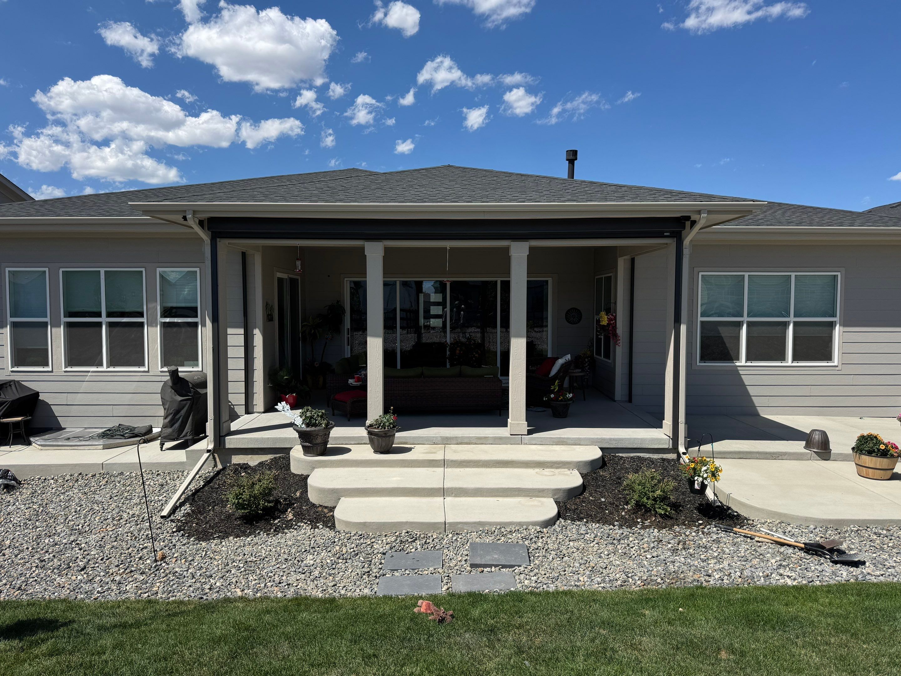 Retractable All-Weather Screen Installation for Castle Rock Covered Patio by Outdoor Solutions Colorado