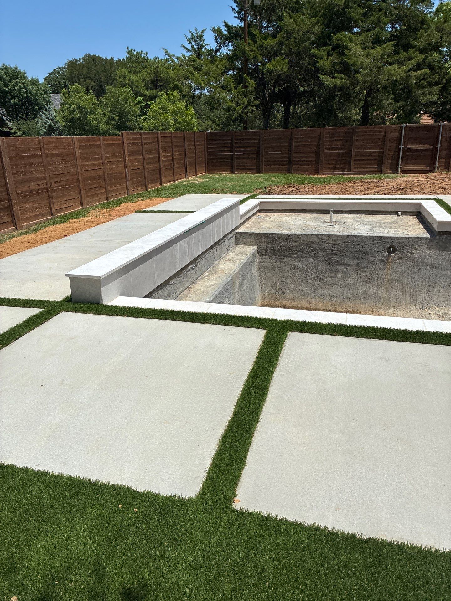 Modern Geometric Pool with Integrated Spa and Turf-Inlaid Decking by Pinnacle Pools and Spas - DFW