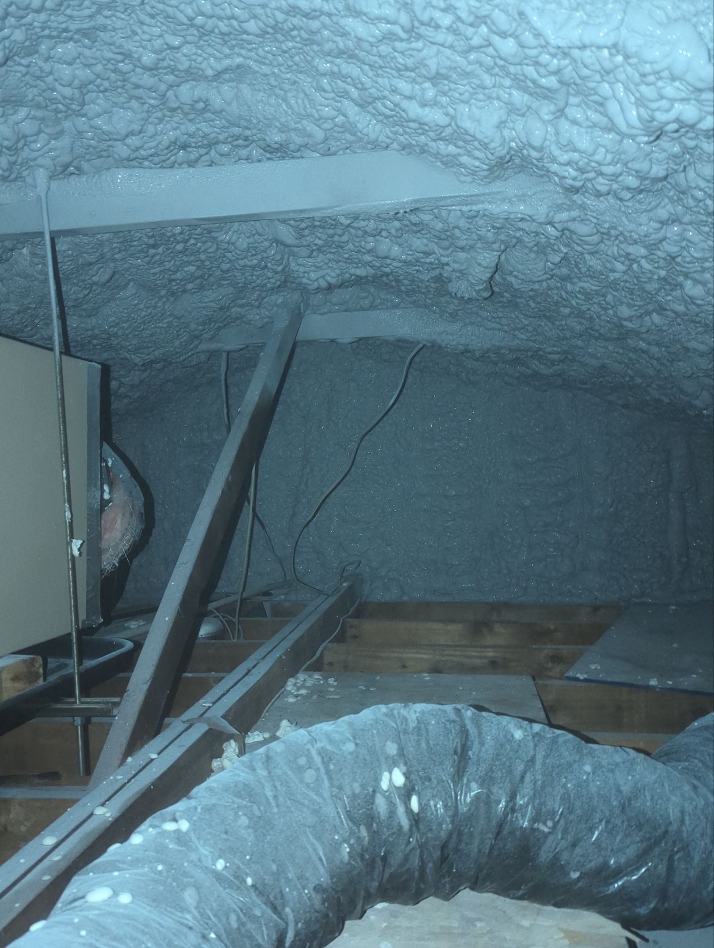 Attic Retrofit using open cell spray foam by NYS Foam & Energy