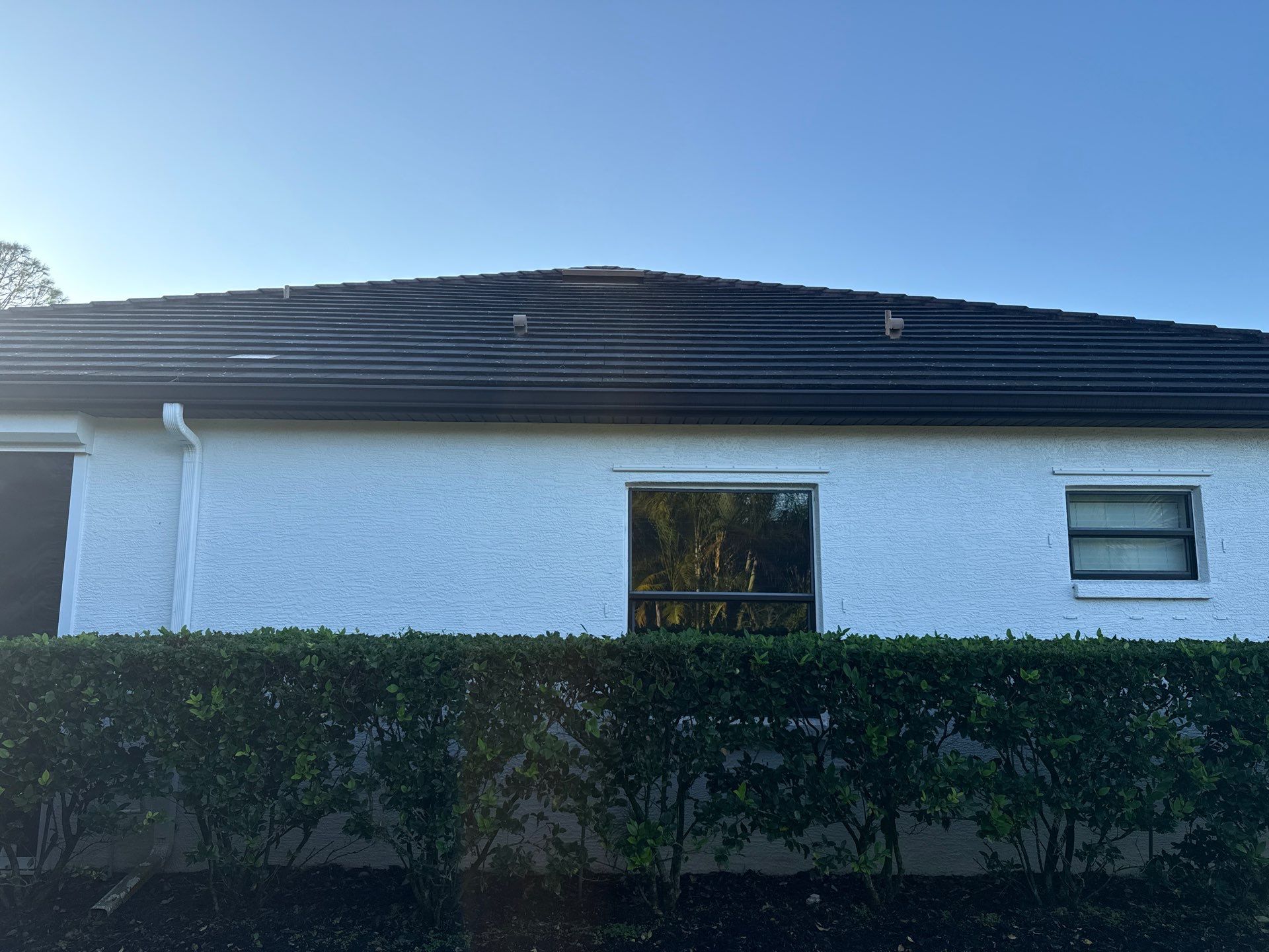 Flat Tile Roof, Paver Pool Deck & Driveway Cleaning | Cove at Twin Rivers, Parrish FL by Sunshine AquaWash