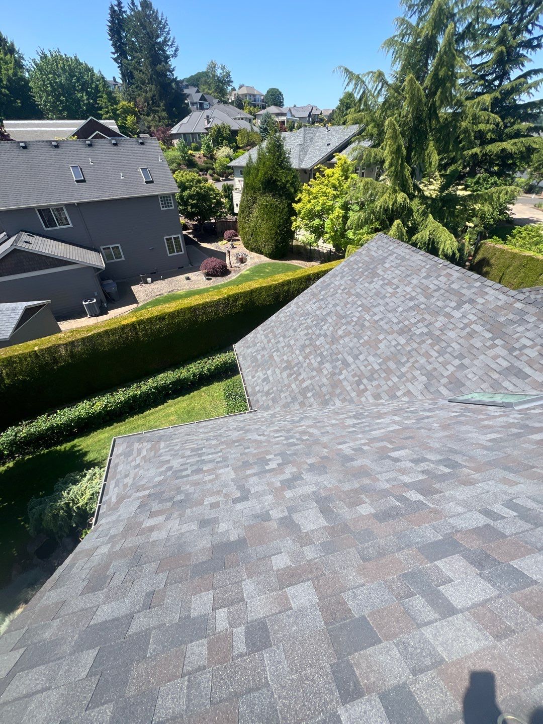 Residential Roofing Installation using Malarkey Vista (Color: Black Oak) by Orezona Building & Roofing Company, Inc.