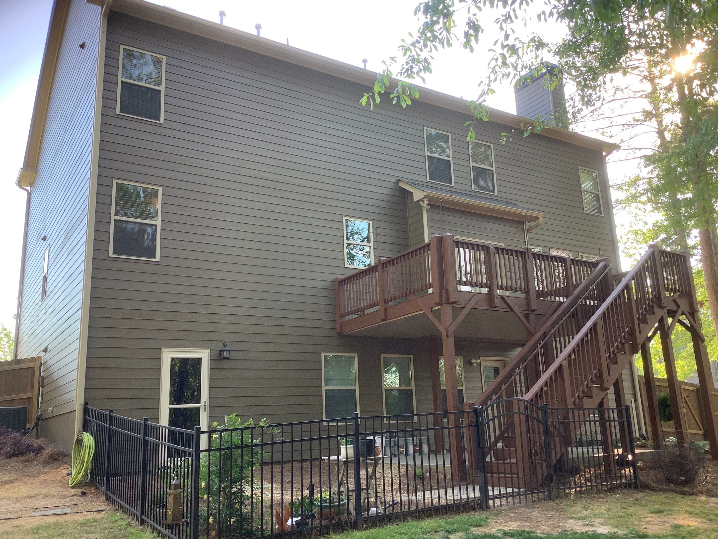 Multi-Surface Exterior Painting for Two-Story Residence in Powder Springs by Swift Home Renovations