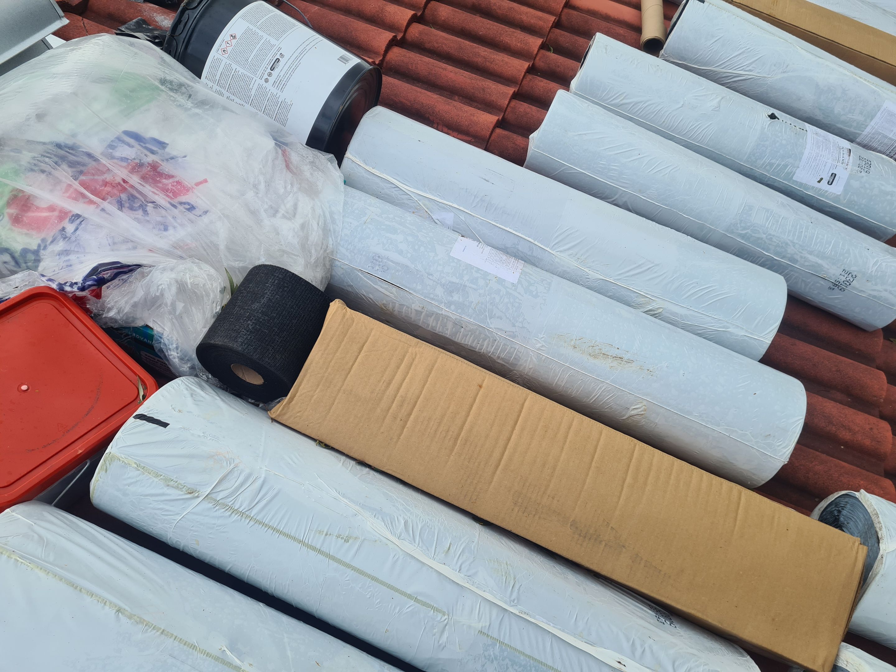 Residential Roofing Installation using 1" Nail strip metal roof by BLUES BROTHERS CONSTRUCTION CORP