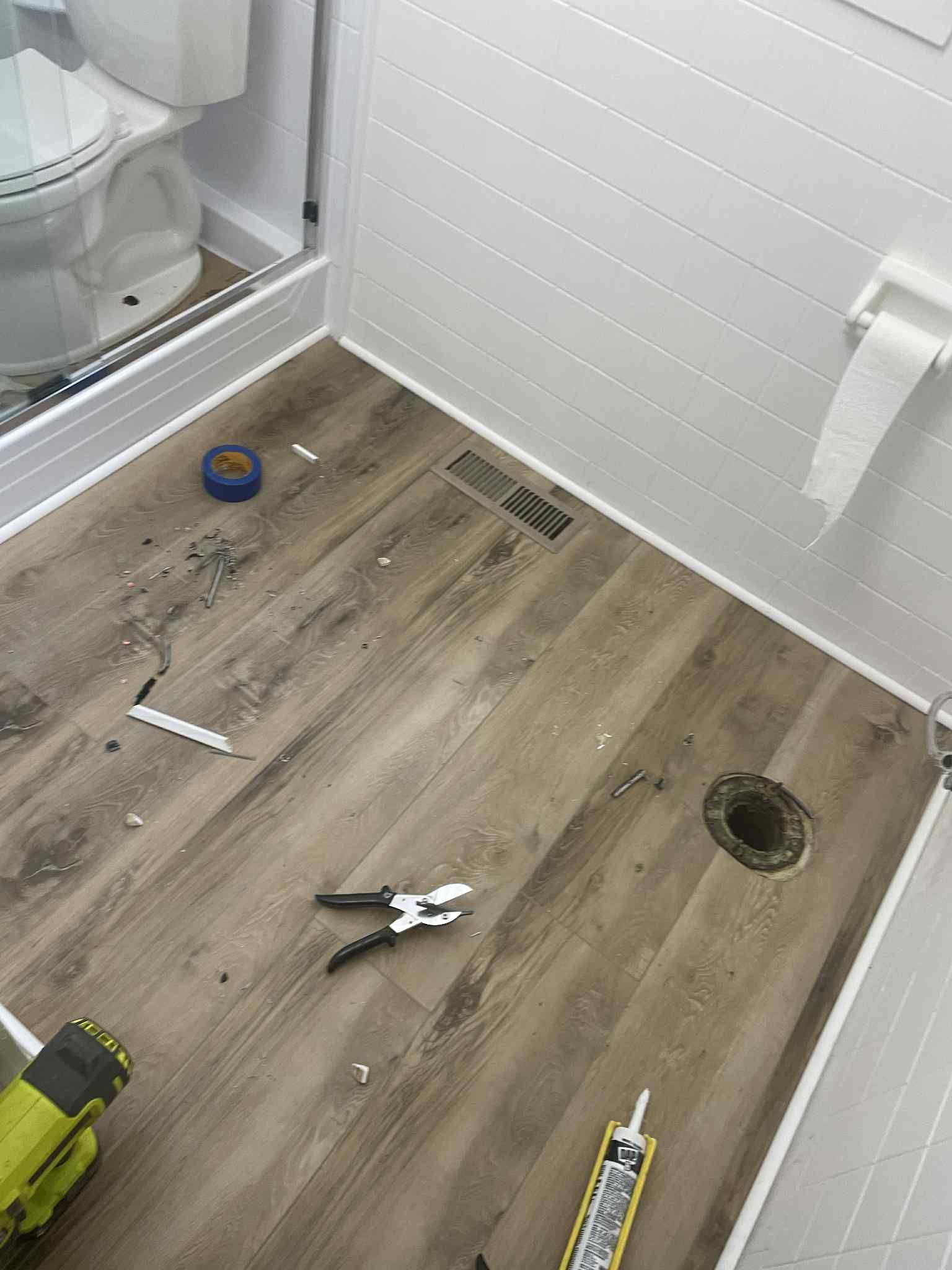 Bathroom Floor Installation by Axtra Hand