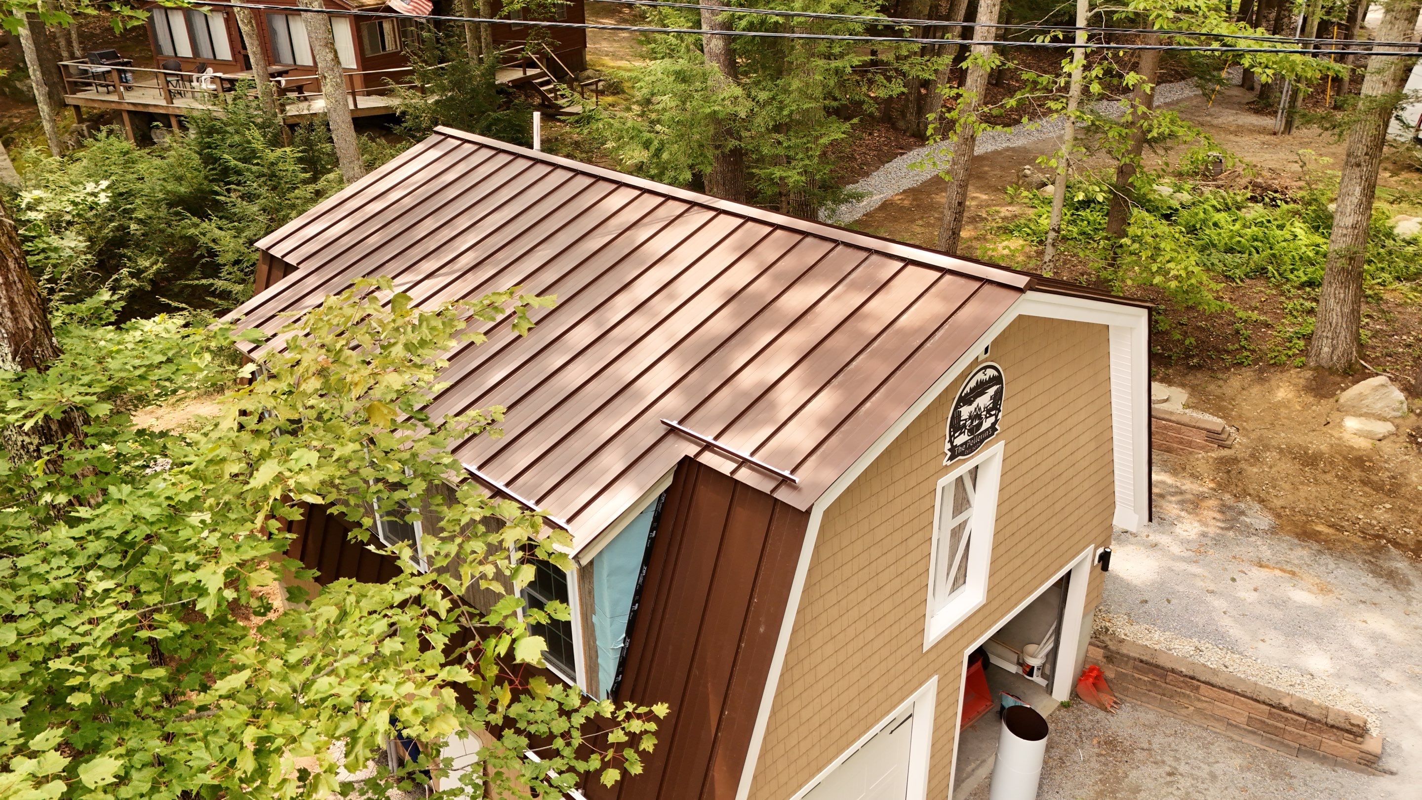 Standing Seam Metal Roof Replacement in Weare, NH – Drexel Roofing System  by Compass exteriors
