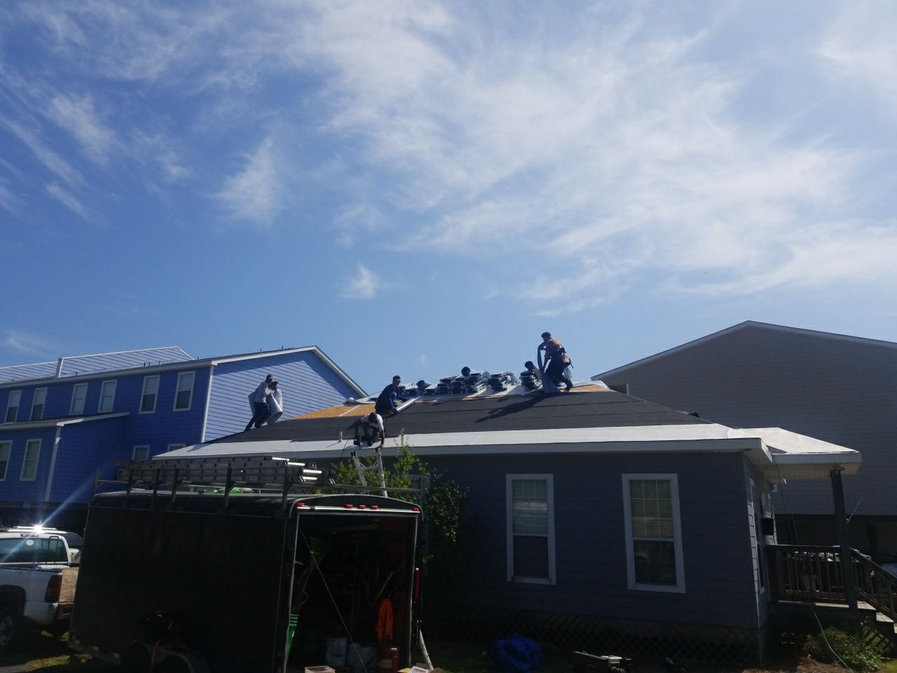 Residential Roofing Installation using Roof Replacement by American Roofing & Construction LLC