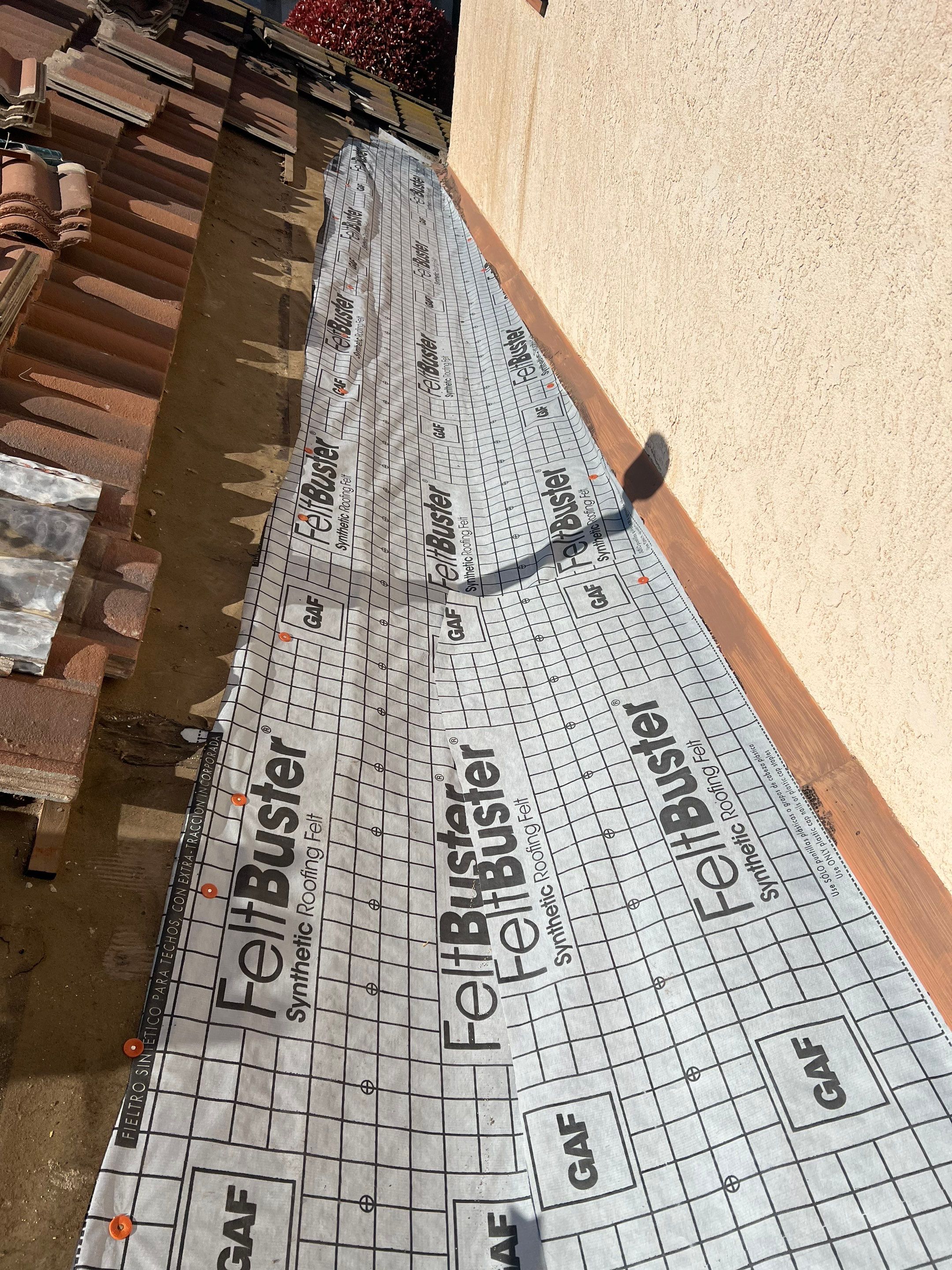 Tile Roof repair by Grandmark Service Company