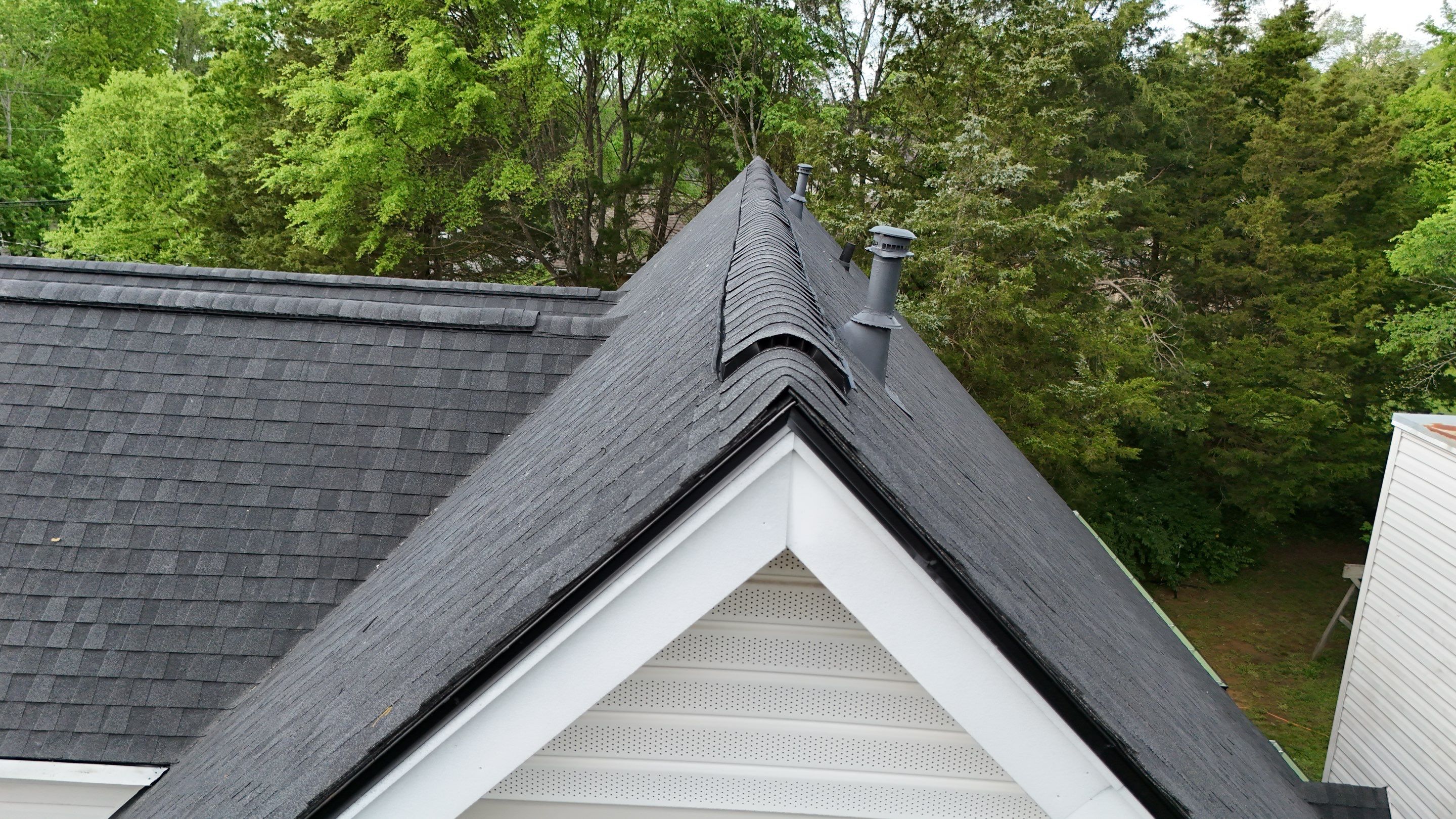 Charcoal Black Re-Roof by Royal House LLC