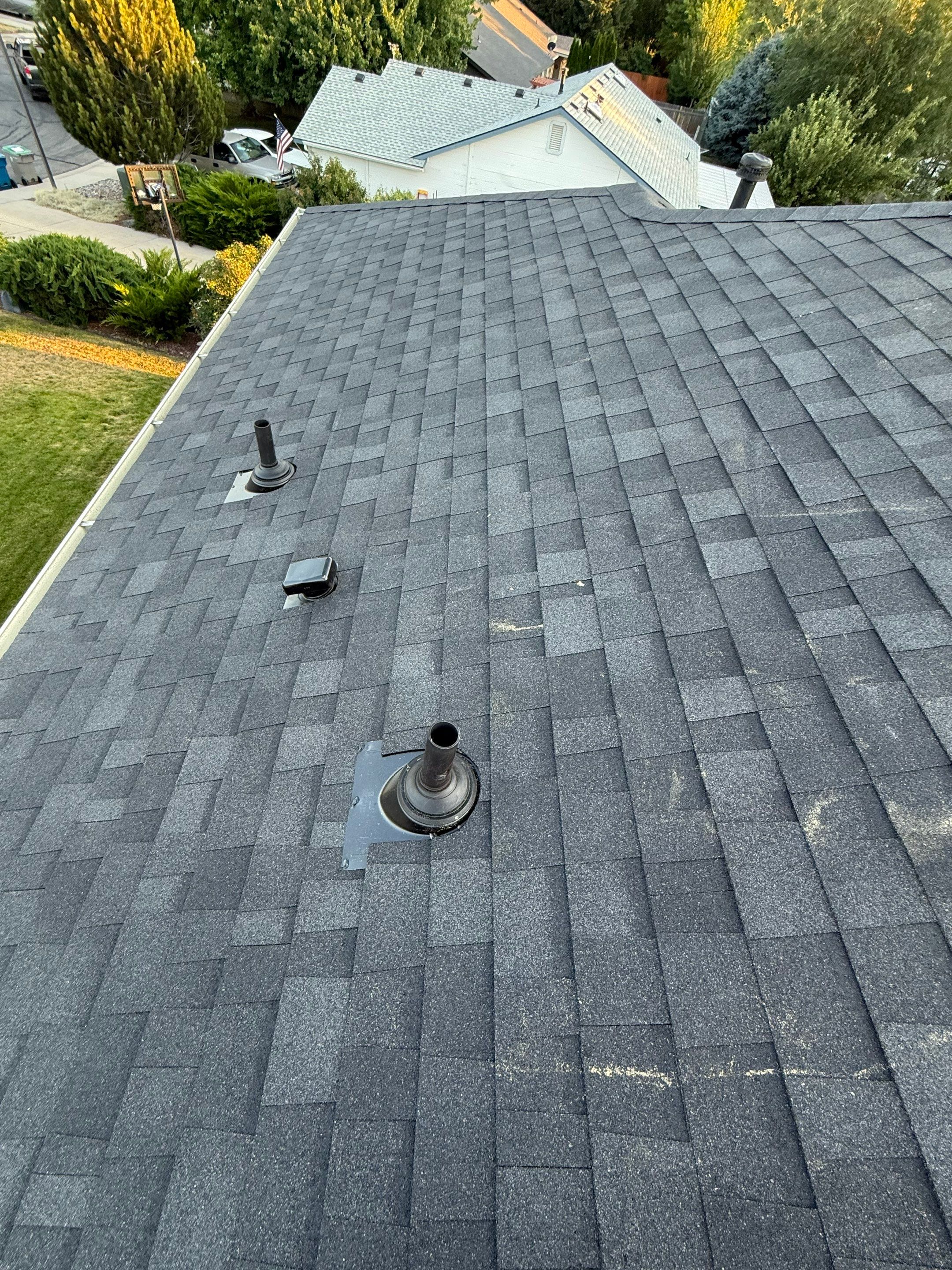Residential Roof Replacement and Seamless Gutter Installation in Boise by Olive Roofing