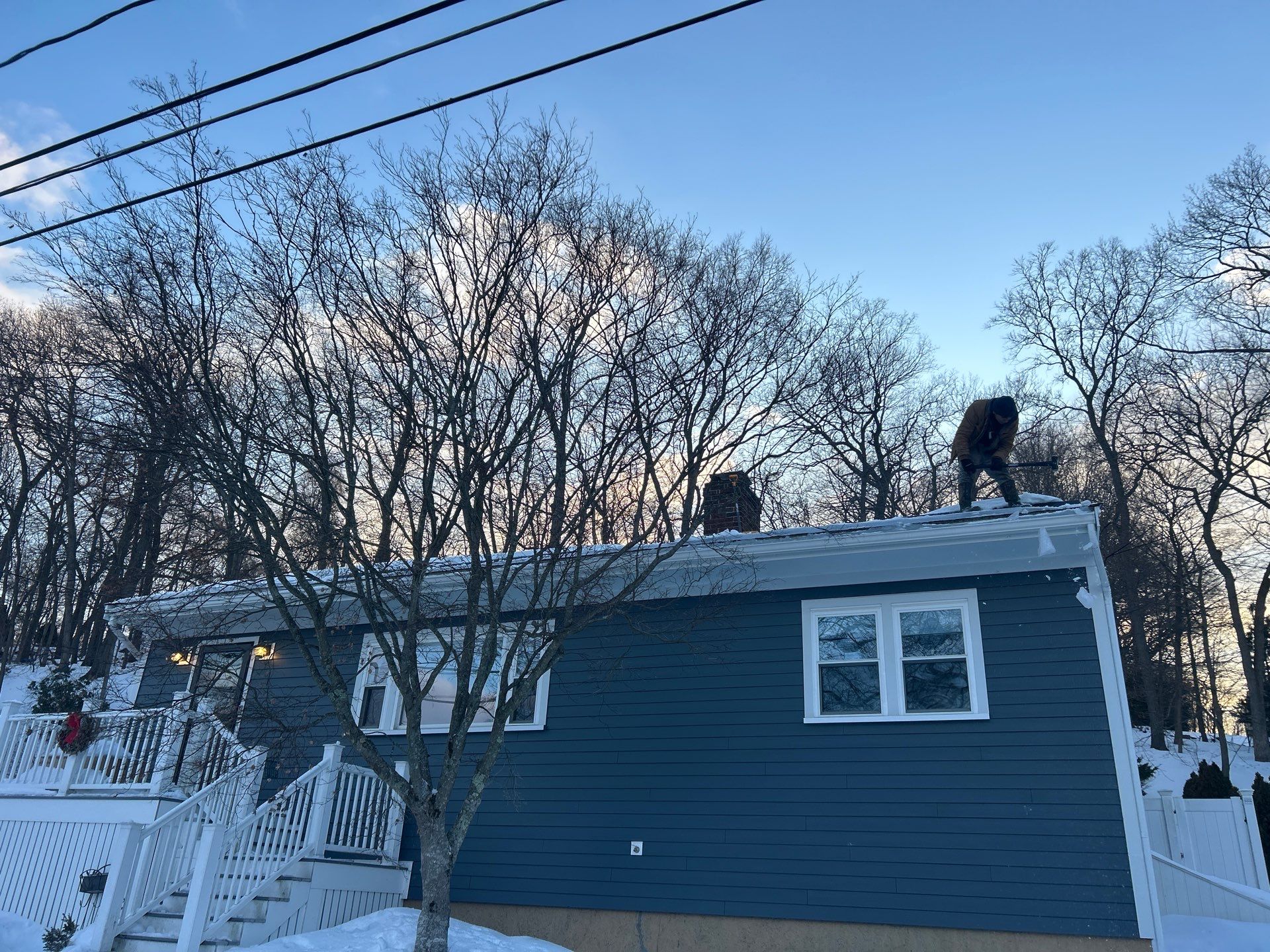 Ice Dam Removal & Snow Removal in Woburn, MA by Mighty Dog Roofing of Greater Middlesex County
