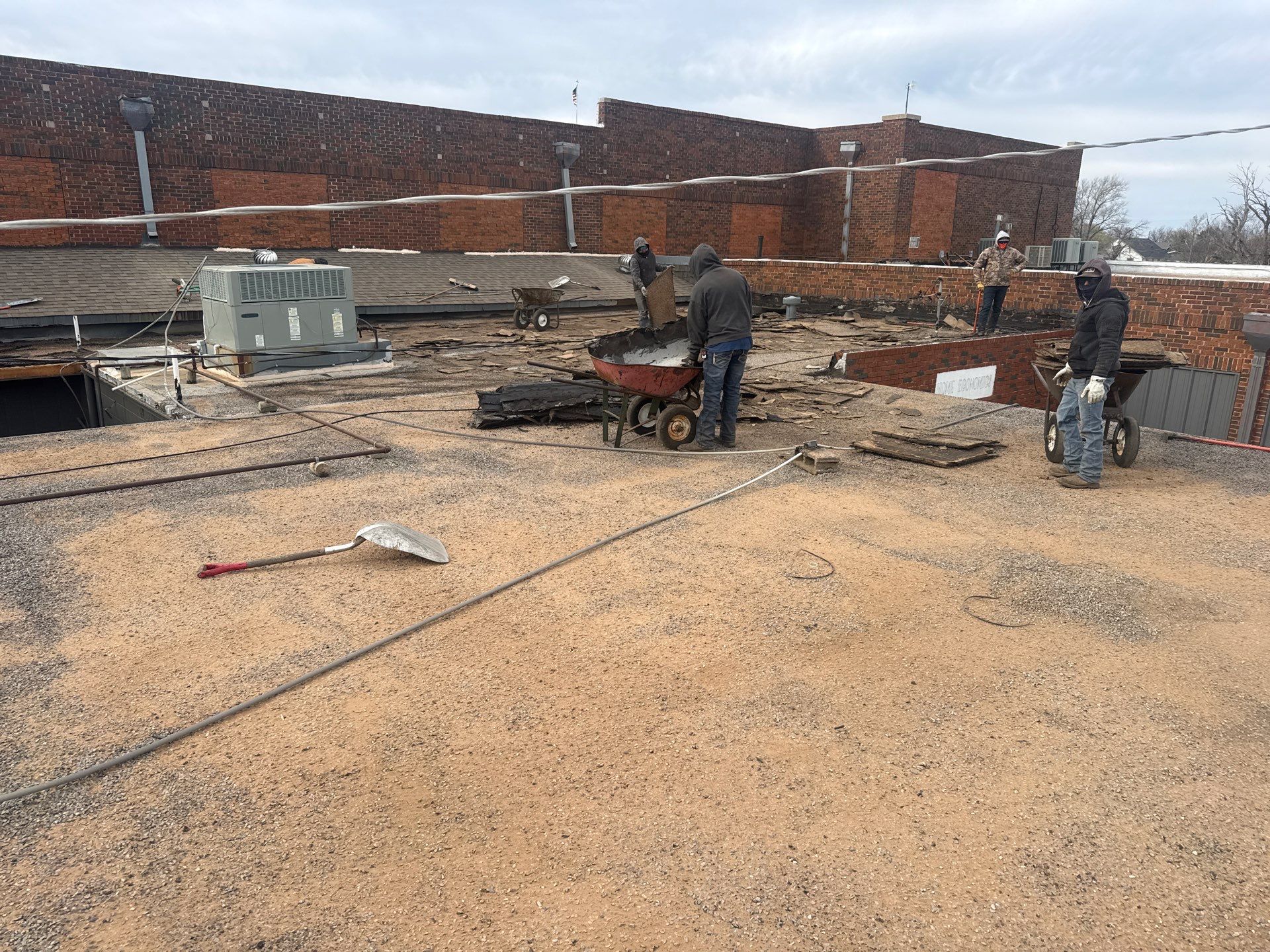 Hollis High School Comprehensive TPO Roof Replacement and Restoration by Secondary Rhodes