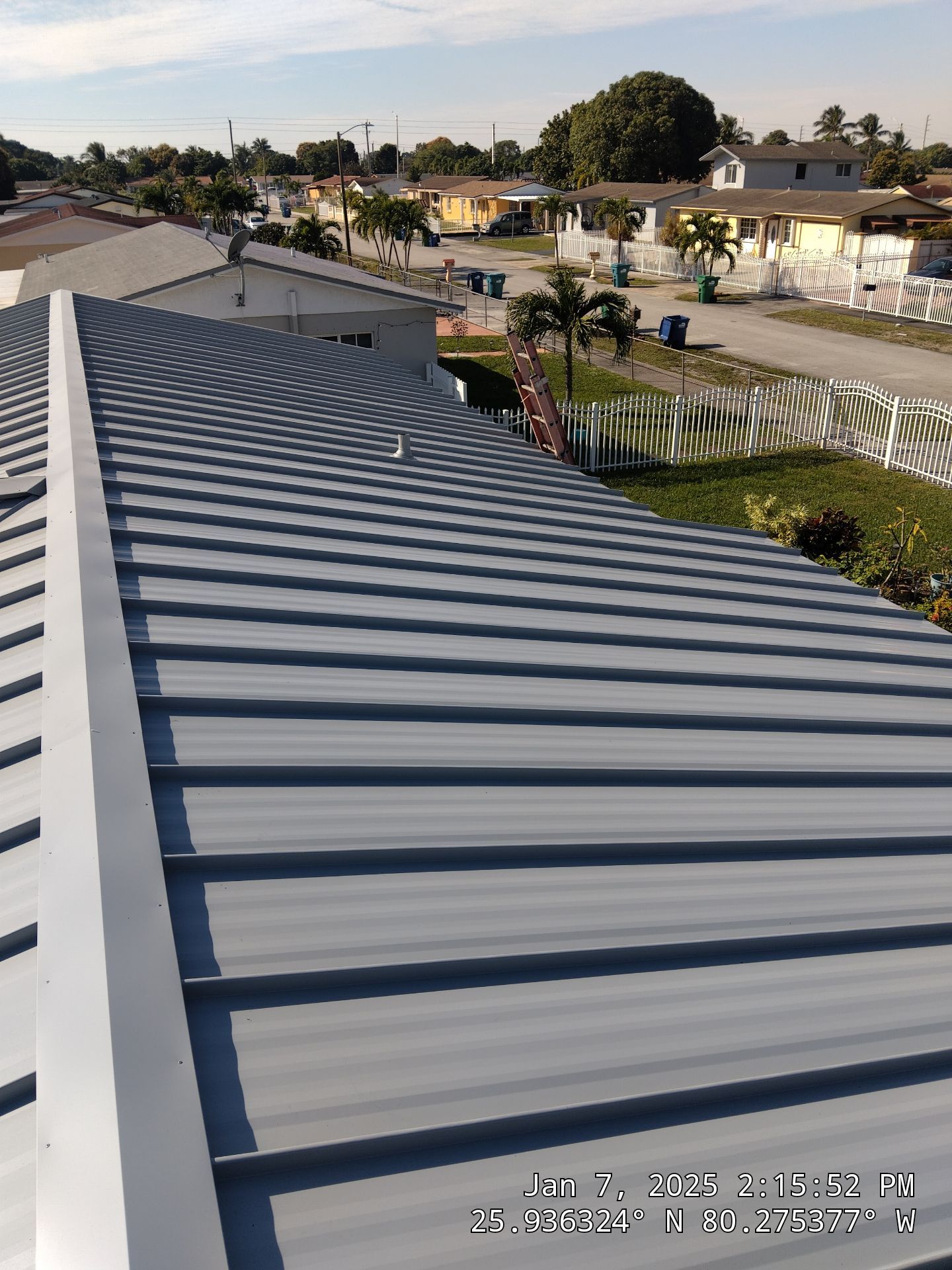 RESIDENTAL METAL REROOF 24 GUAGE DOVE GRAY 1-1/2" MECHANICAL SEAM METAL POLYGLASS POLYSTICK XFR by Earl W. Johnston Roofing 