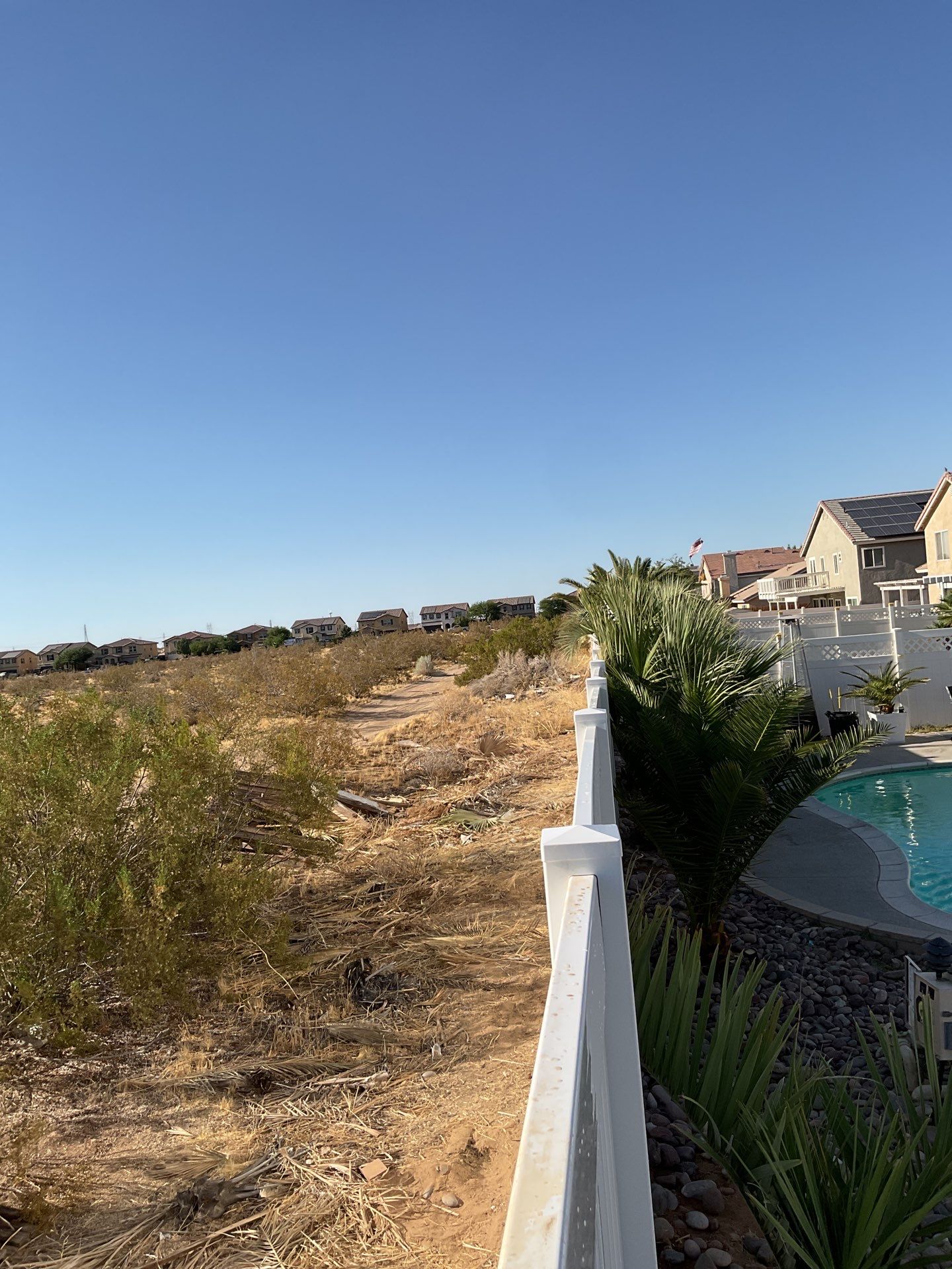 Lattice Vinyl with Privacy Vinyl Fence by Fence Guys Inc.