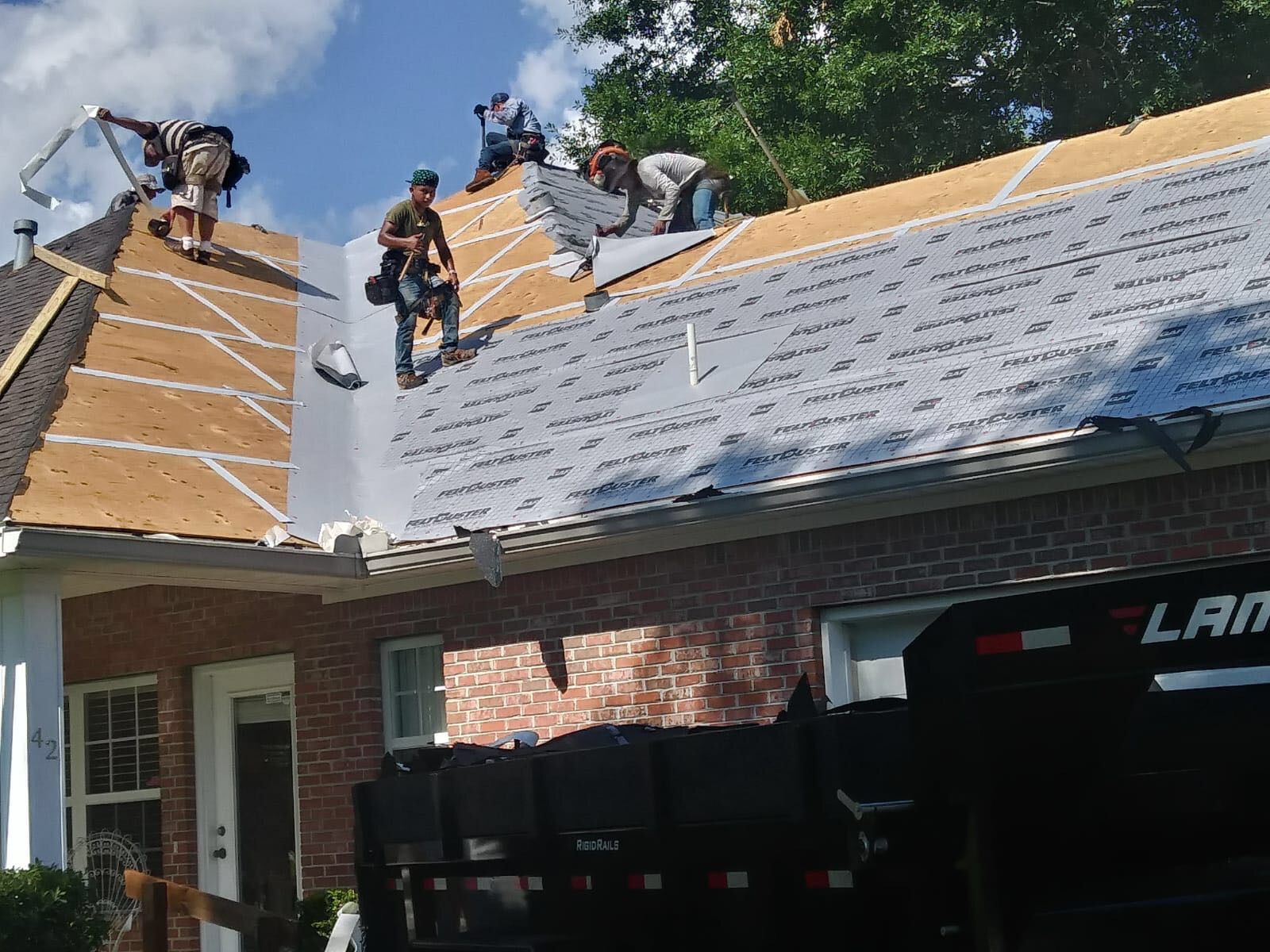 Residential Roofing Installation using Roof Replacement by American Roofing & Construction LLC