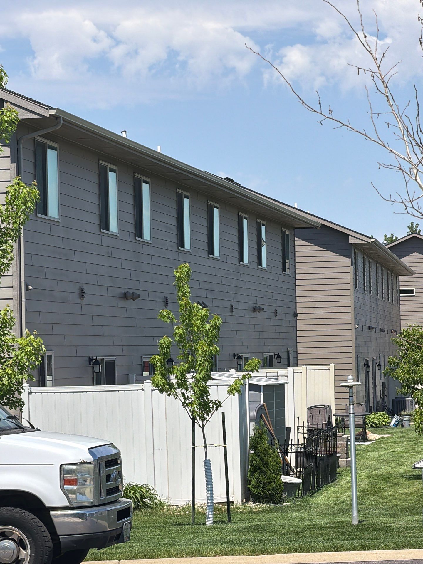 Multi-Family Exterior Painting and Trim Refresh in Sioux Falls by Select Painting, Coatings & Garage Cabinets
