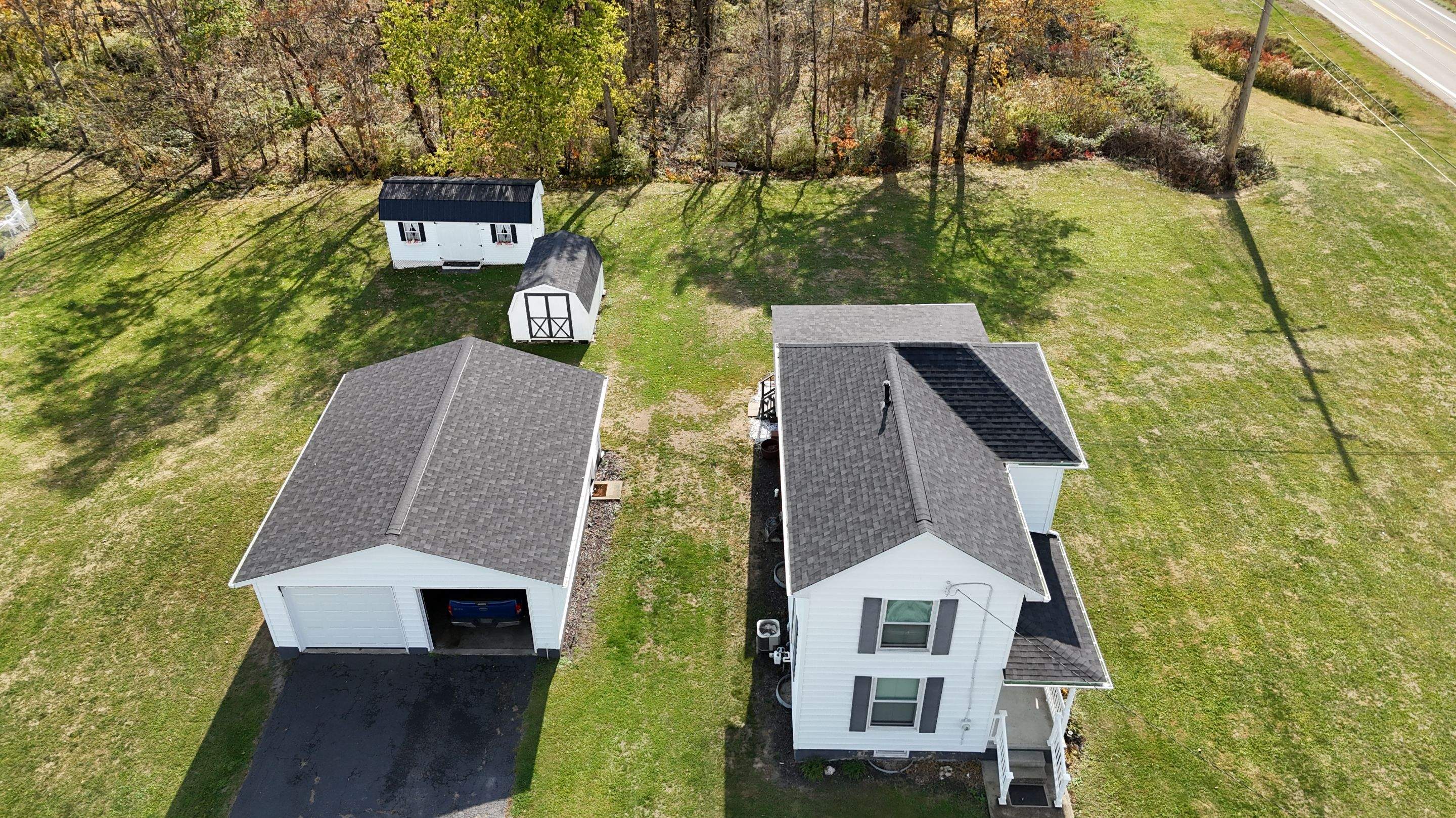 Roseville, Ohio Shingle Roof and Siding Installation by Pine Ridge Roofing LLC
