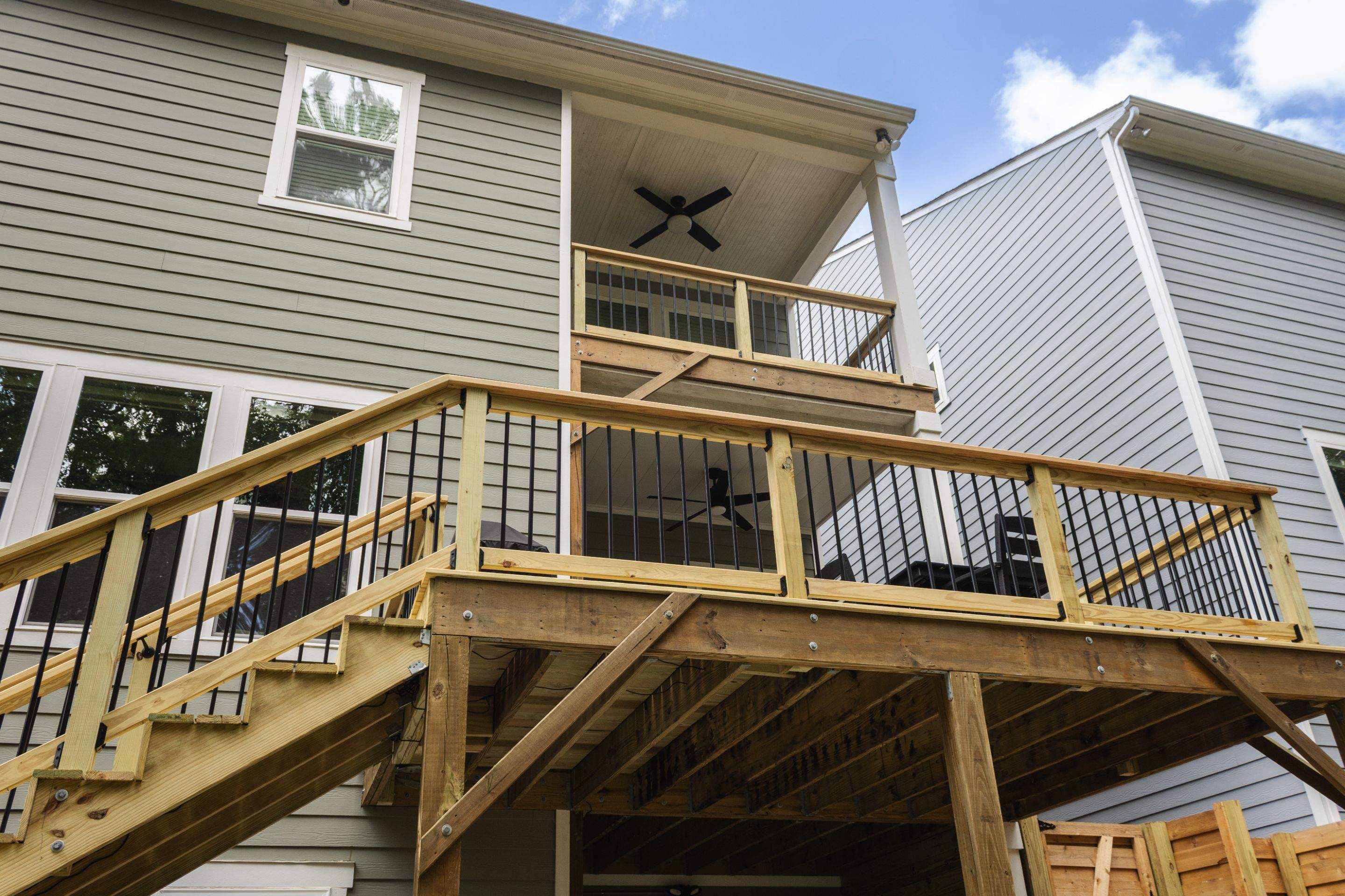 Decatur, GA Multi-Deck Rebuild using Pressure Treated Pine with Trex LED Riser Lights by Nelson Exteriors 