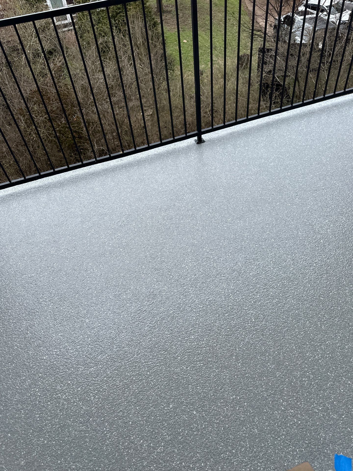 Patio Floor Coating using Custom Color by My Garage Floor Guys