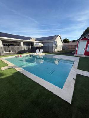 Pool build with baja step and pebble finish
