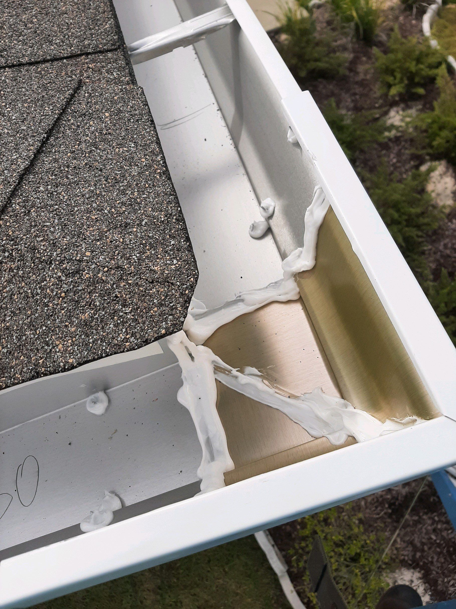 Seamless Gutter Installation using White K-Style Gutters by Gutter Professors