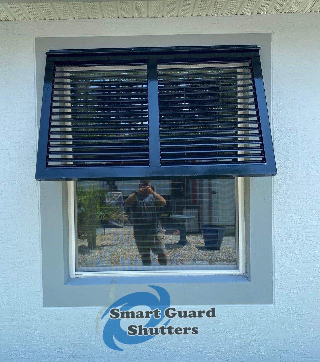 Decorative Half-Length Bahamas in Jet Black by Smart Guard Shutters