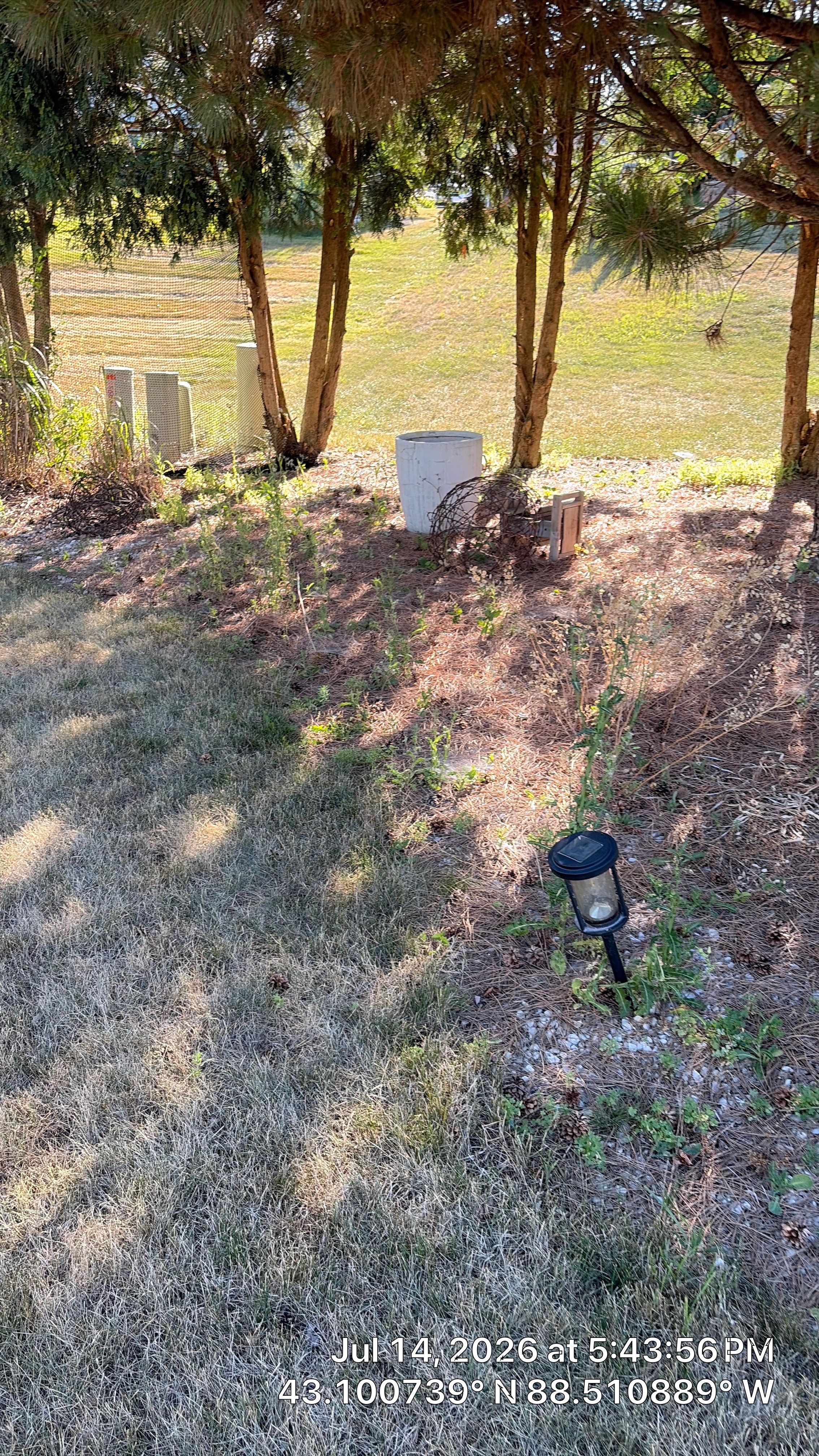 Decorative Stone and River Rock Landscaping for Oconomowoc Residence by CompanyCam Sales Demo