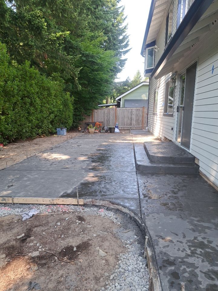 Luo | Colored Stamped Concrete Patio by Jireh Asphalt & Concrete Inc 