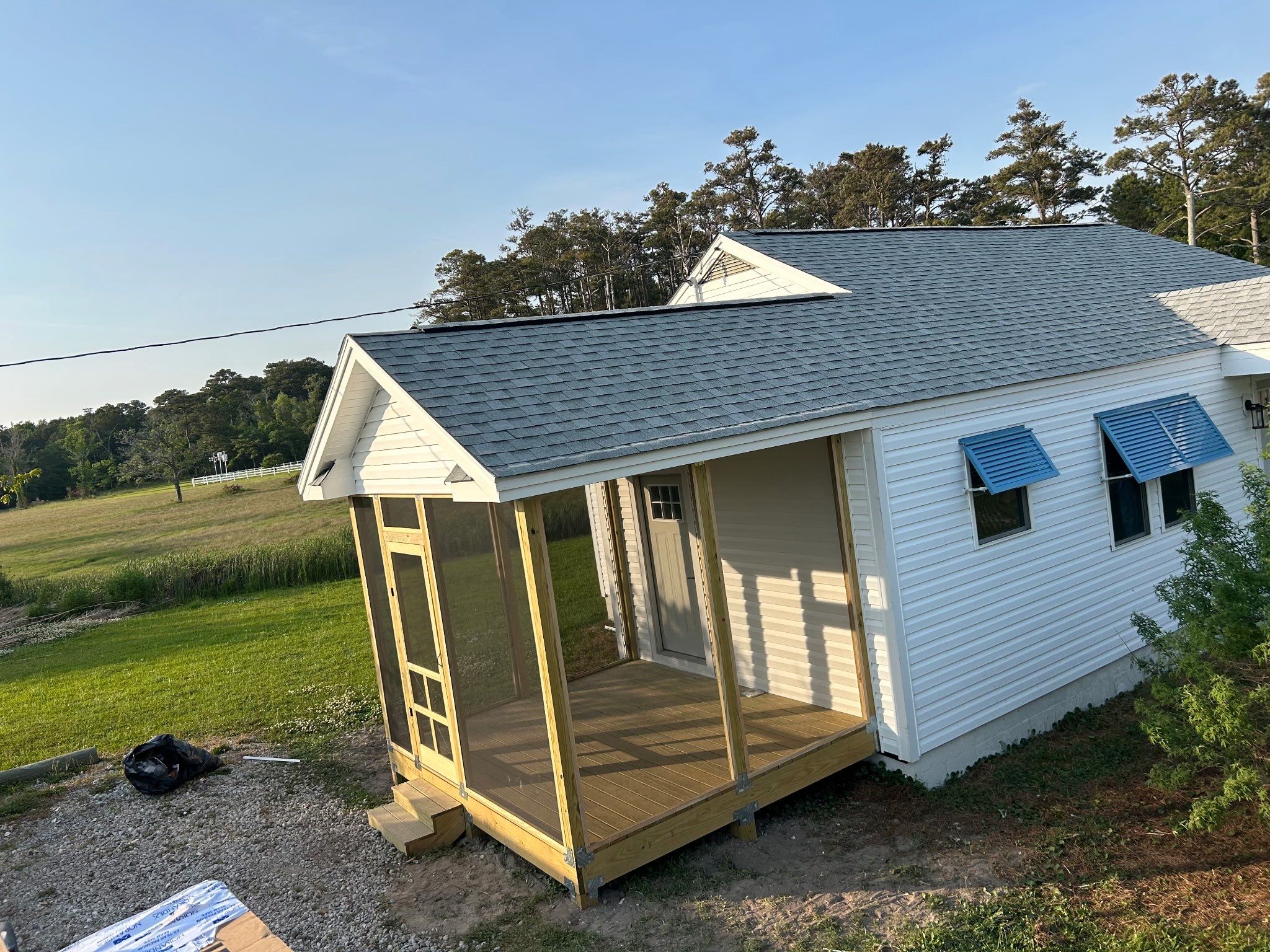 Custom Screened Porch and Deck Addition in Sea Level by The Remodeling Company