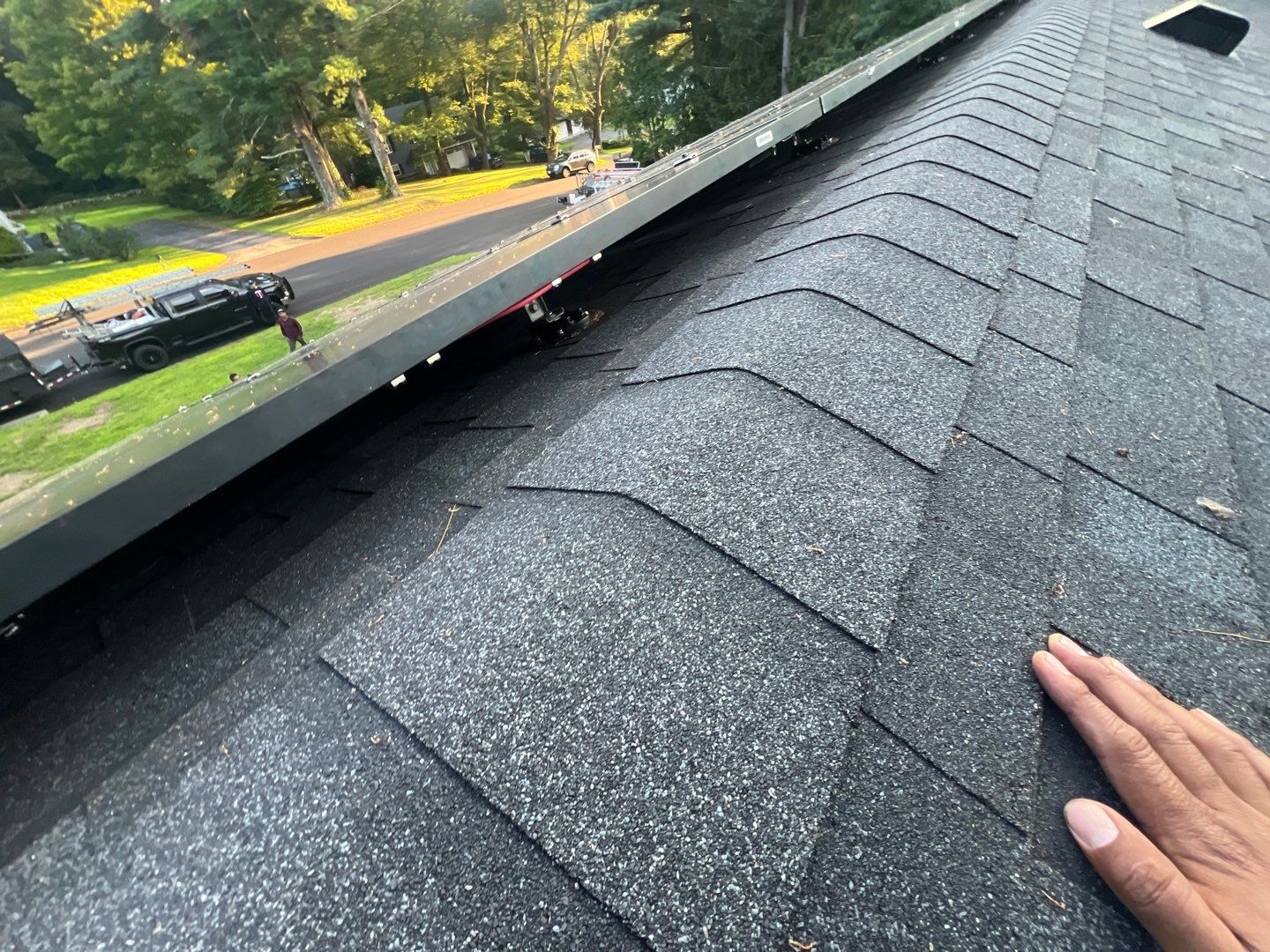 Onyx Black Shingles by Reimagine Roofing