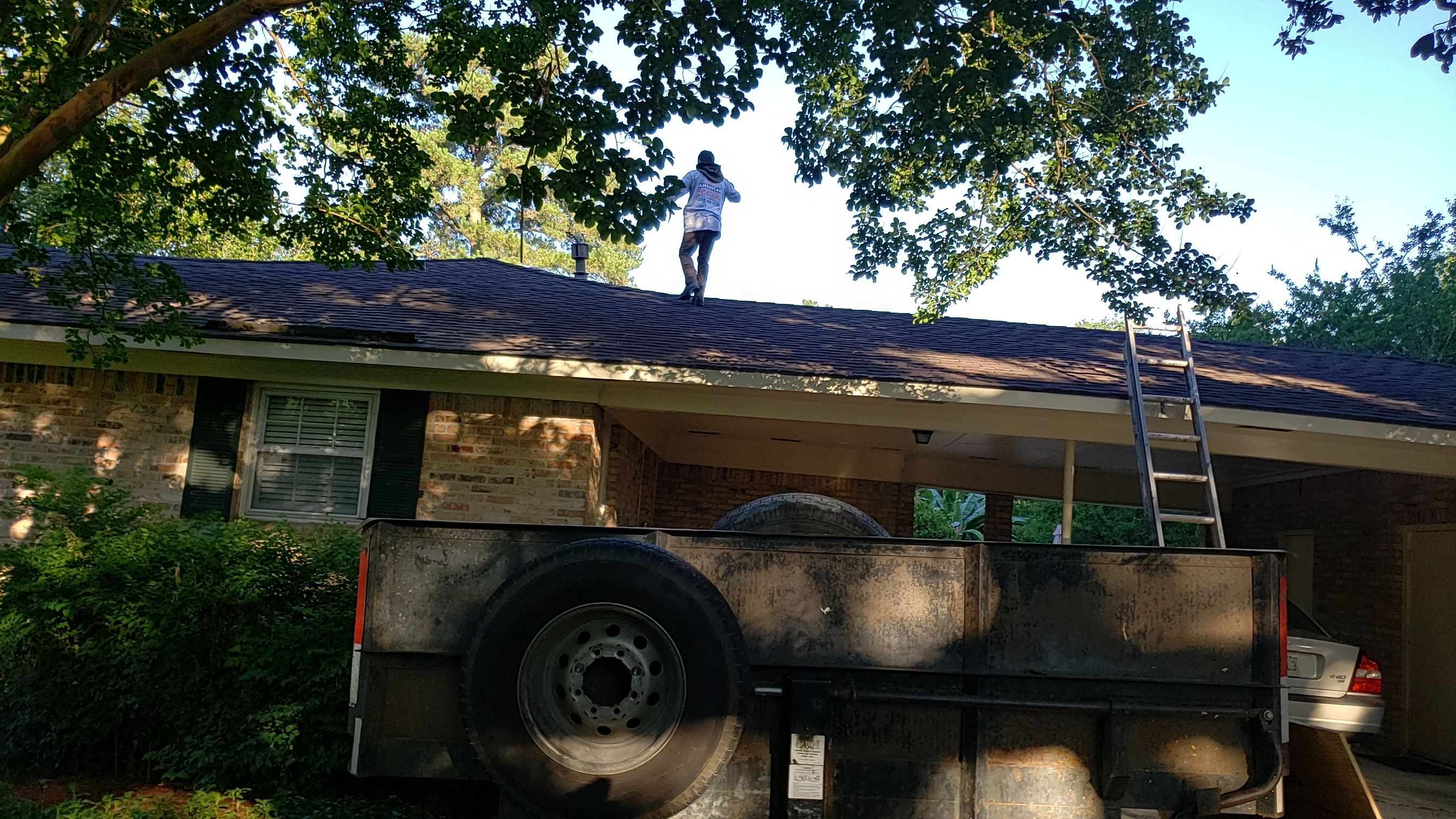 Residential Roofing Installation using Roof Replacement by American Roofing & Construction LLC