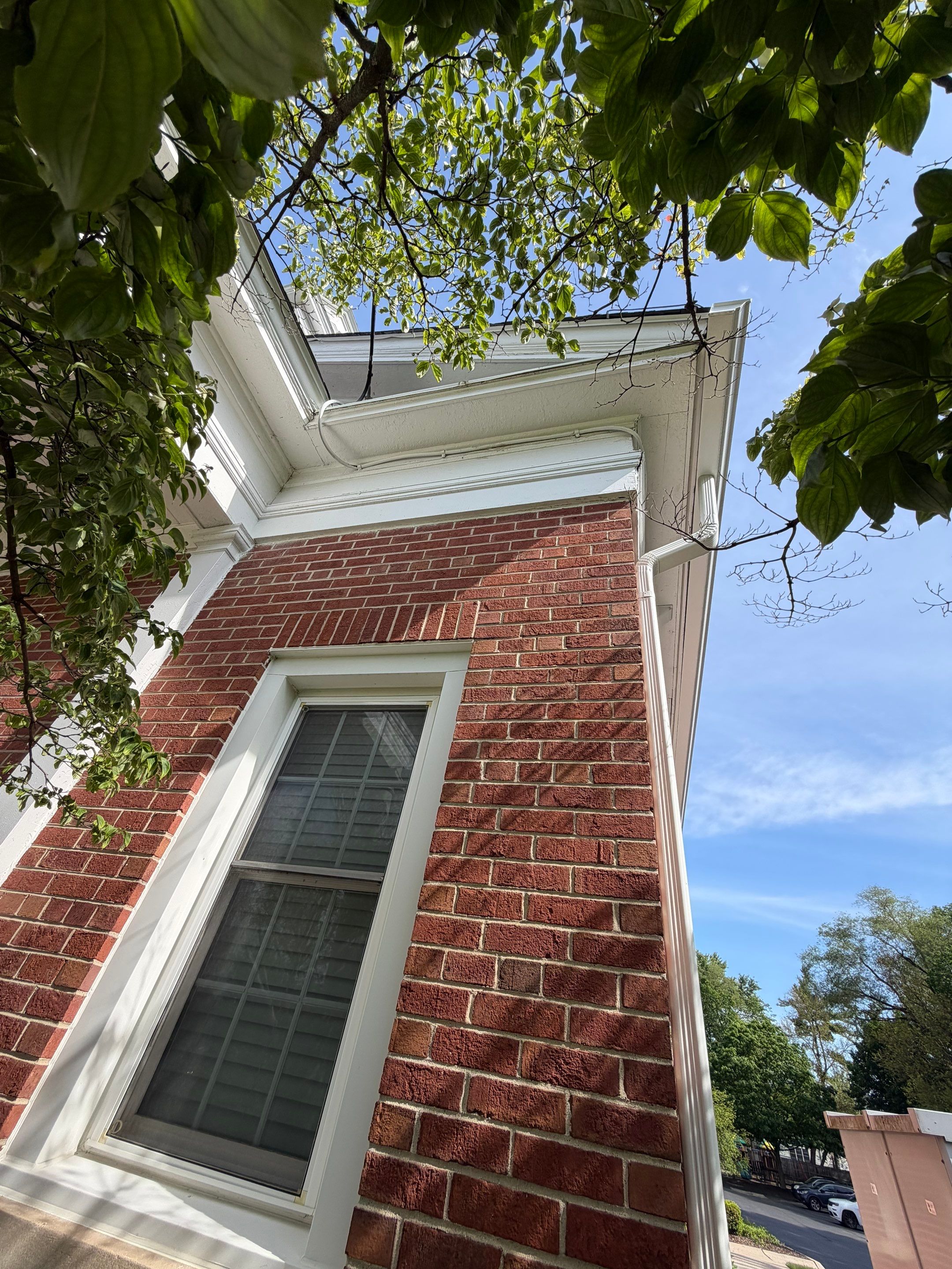 Commercial Wood Trim Restoration and Gutter Replacement in Birmingham by Top Shelf Painter